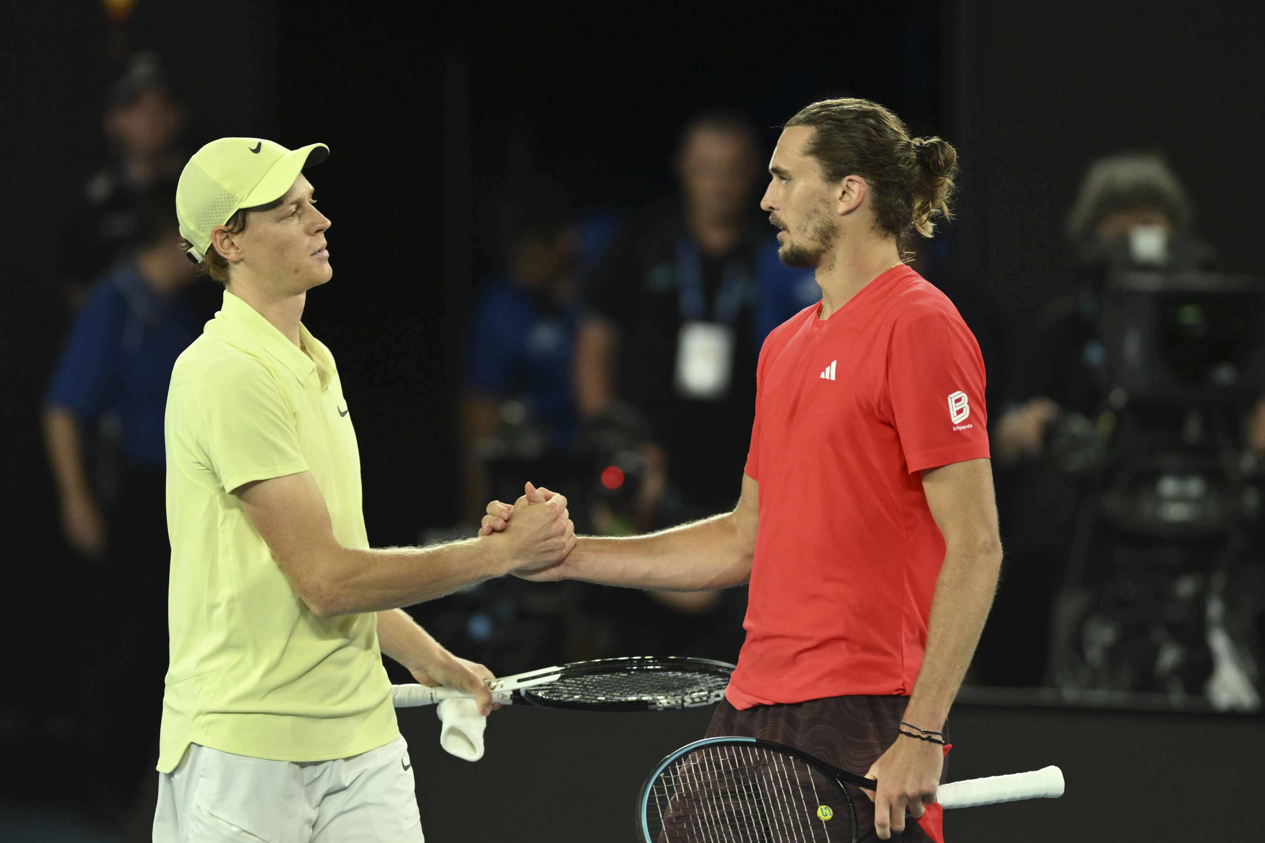 Jannik Sinner (left) and Alexander Zverev embrace after the final.