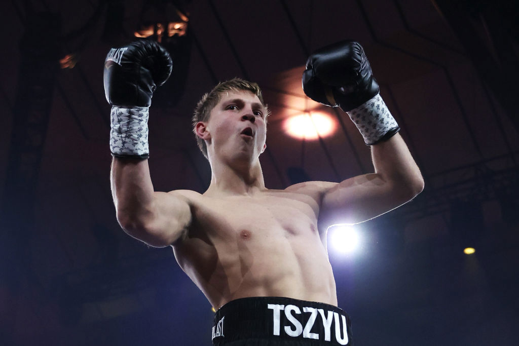 Nikita Tszyu celebrates victory after defeating Benjamin Bommber.