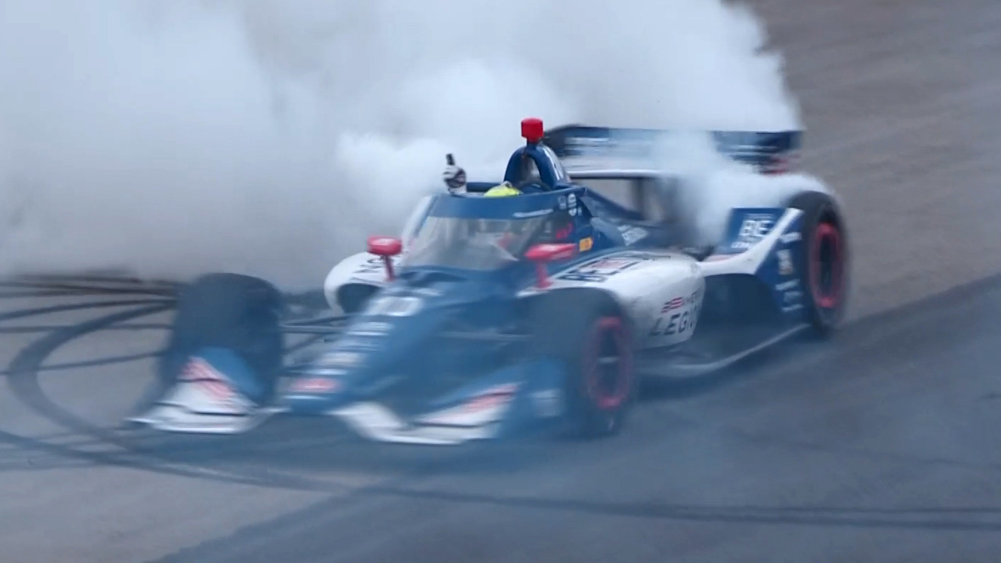 Alex Palou celebrates winning his second IndyCar title at Portland.