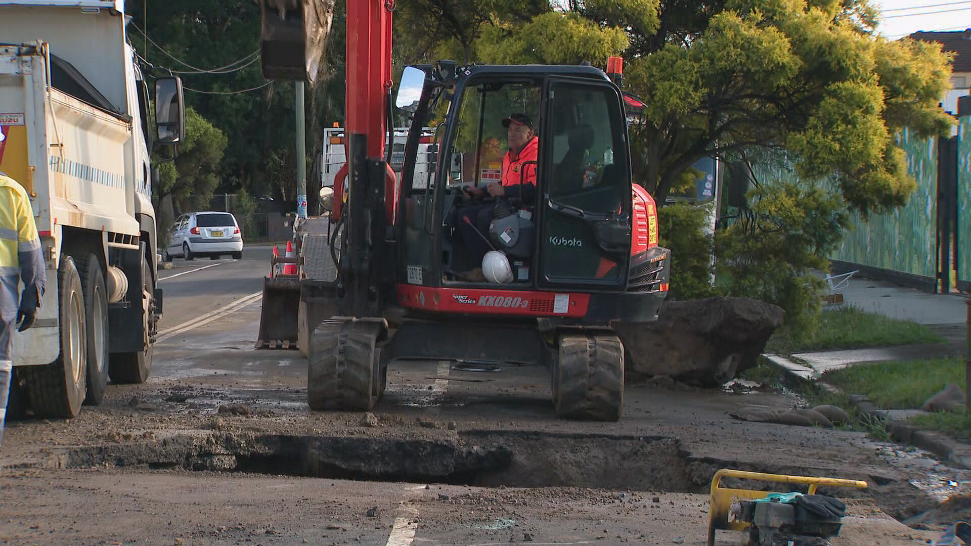 Sinkhole opens above M4 West Connex tunnel in Burwood.