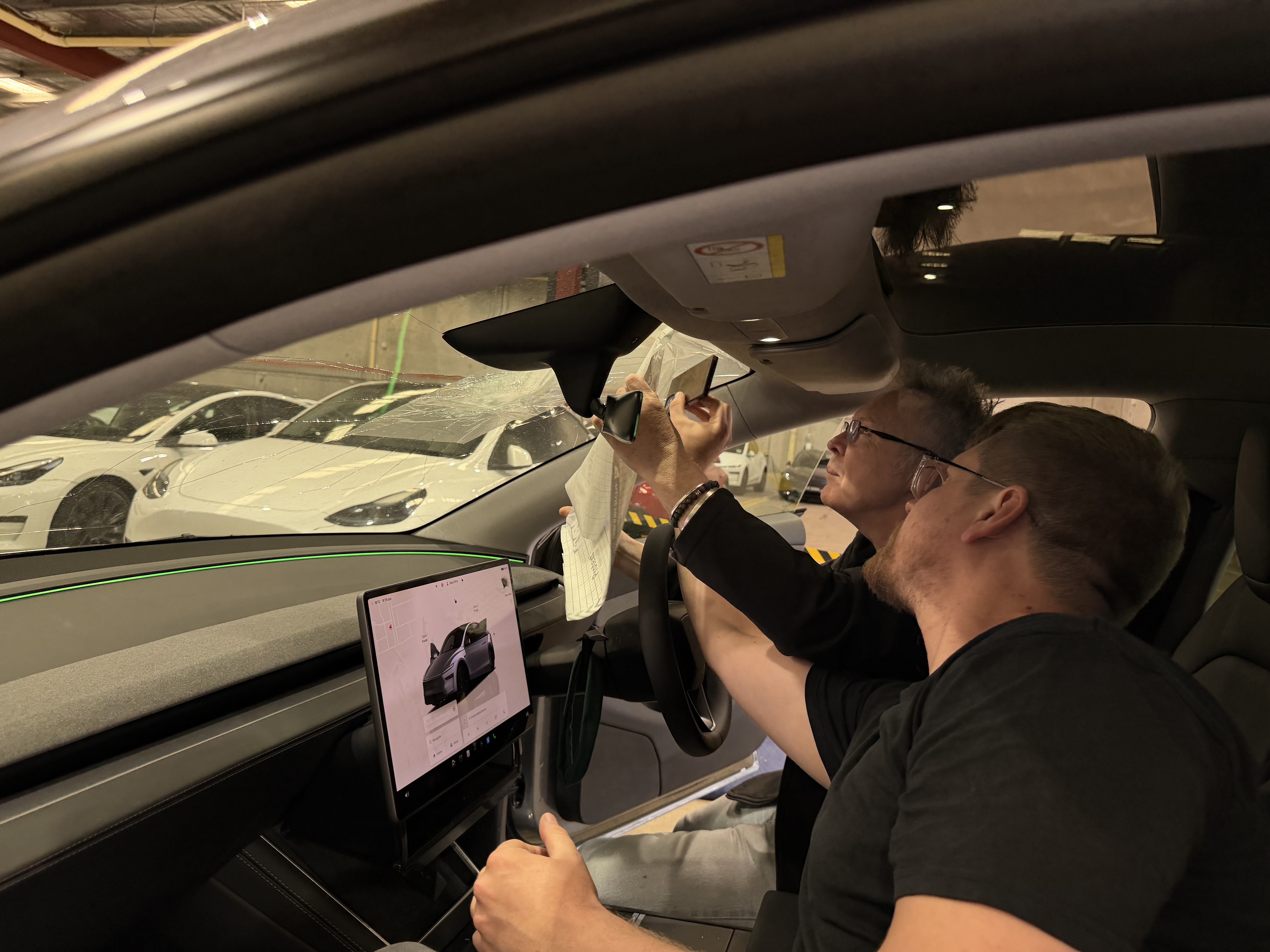 SA Museum experts Tom Bain and Tom Pyrakowski examine the car.