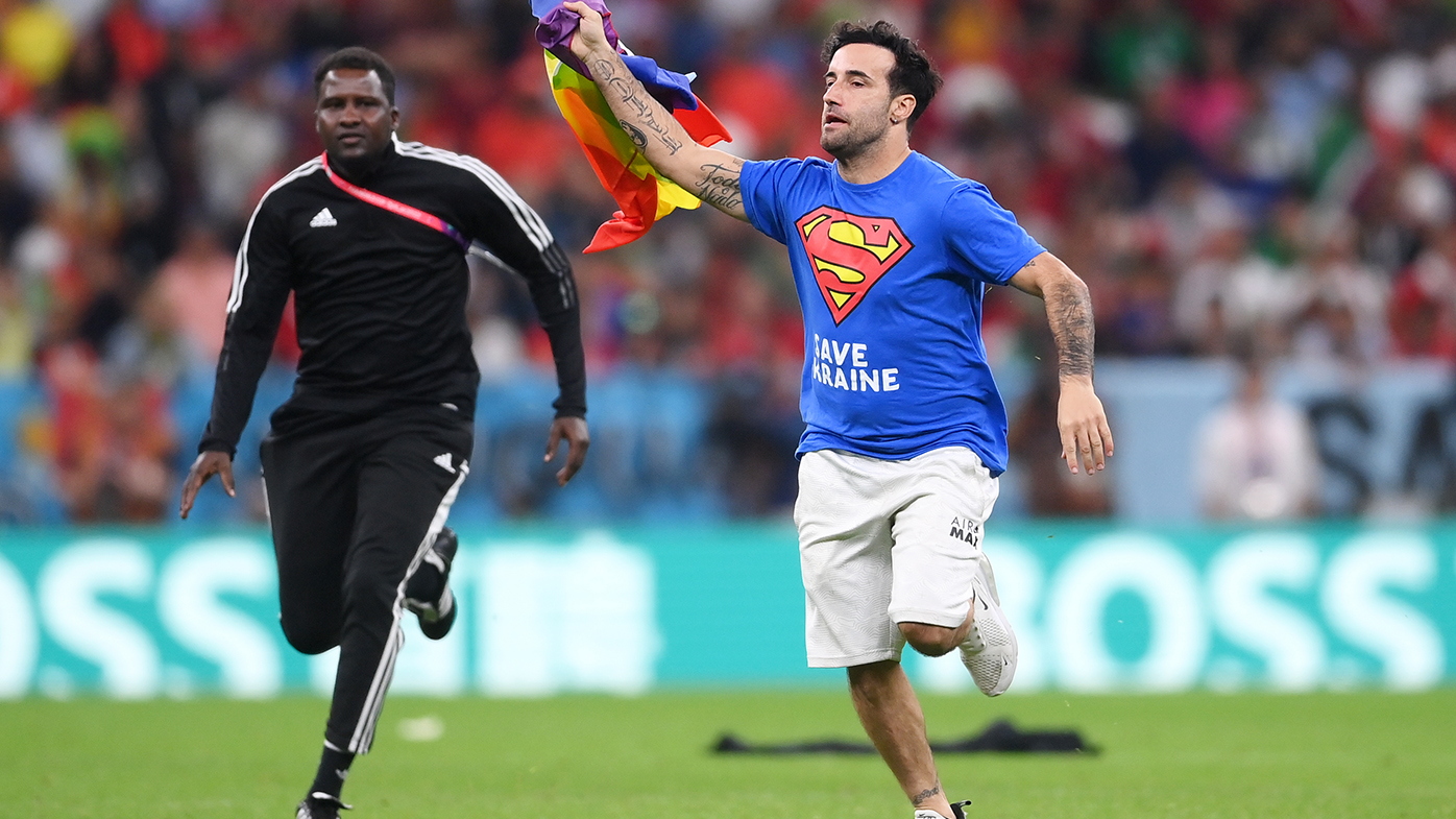 Protester with rainbow flag banned from World Cup matches - The