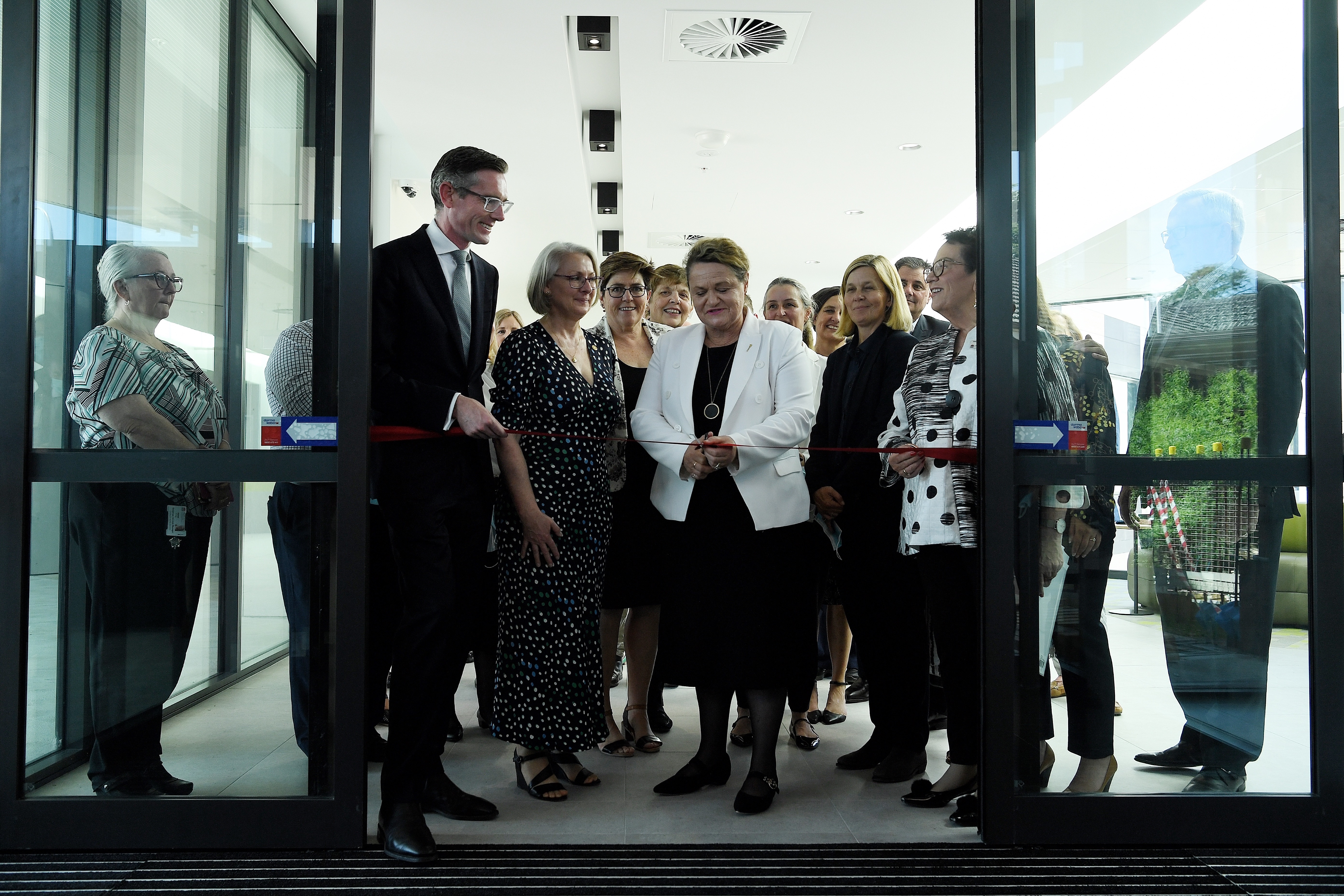 NSW Premier Dominic Perrottet (2nd from left) and Wendy Tuckerman MP (centre white jacket) at the opening of the Goulburn Base Hospitals administrative Services building in Goulburn, NSW. 3rd December, 2021. Photo: Kate Geraghty