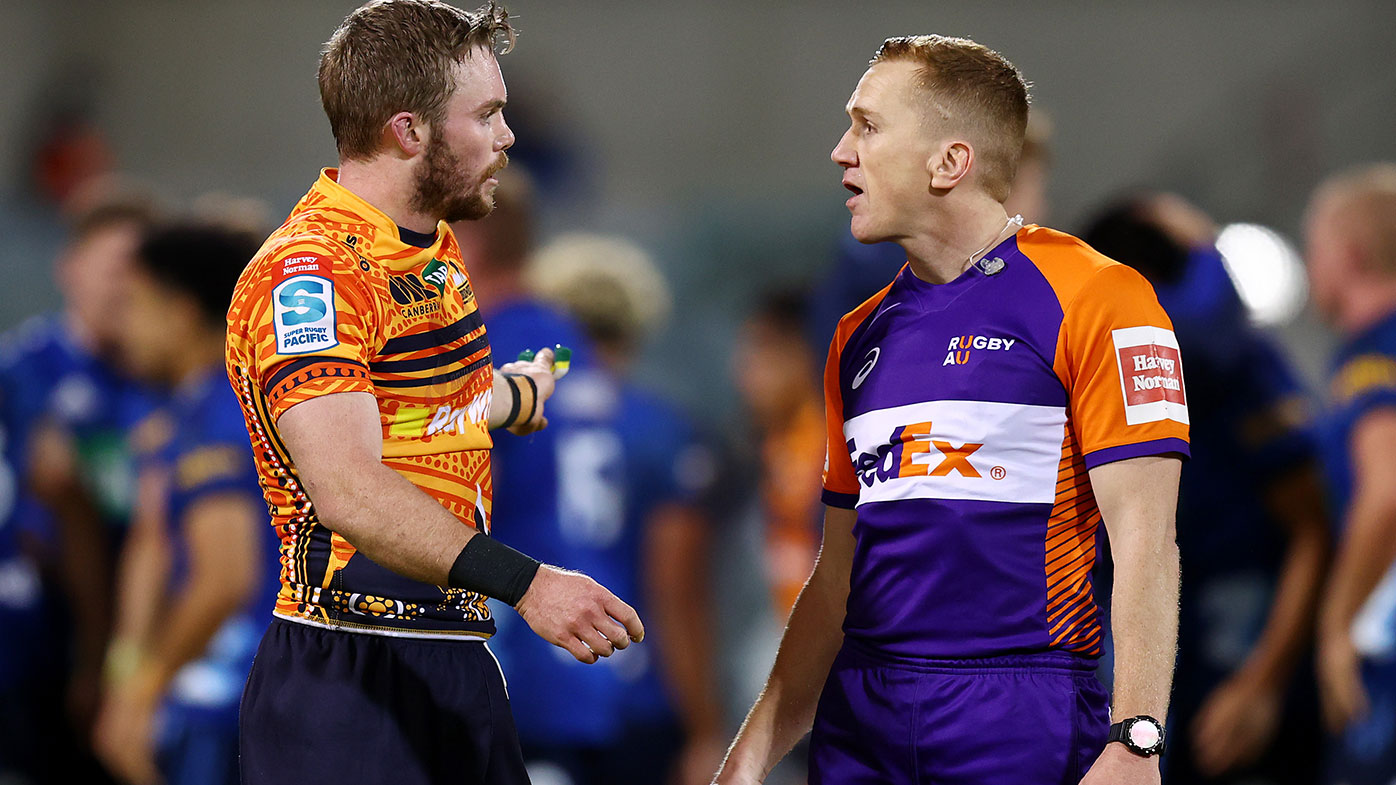 Ryan Lonergan of the Brumbies is seen speaking with the referee