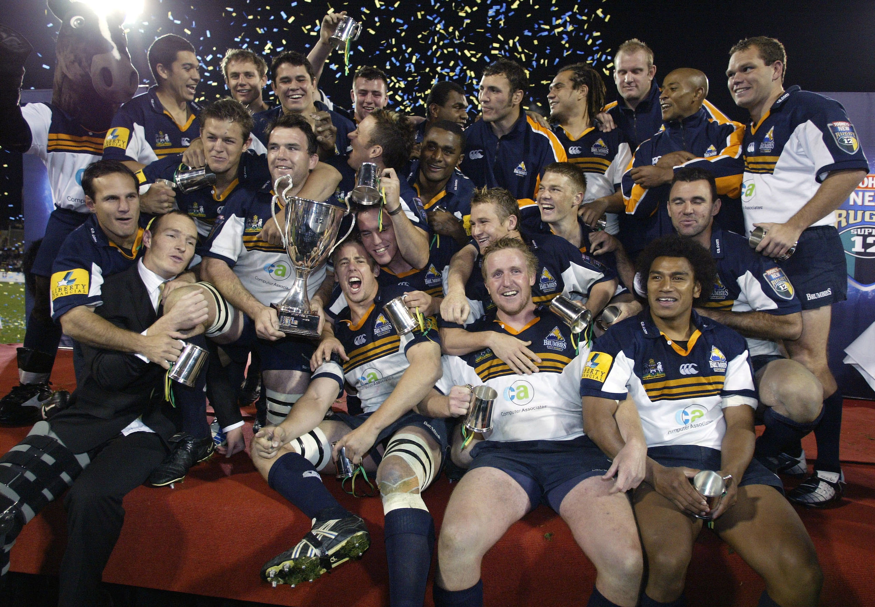 The Brumbies celebrate winning the 2004 Super Rugby title in Canberra.