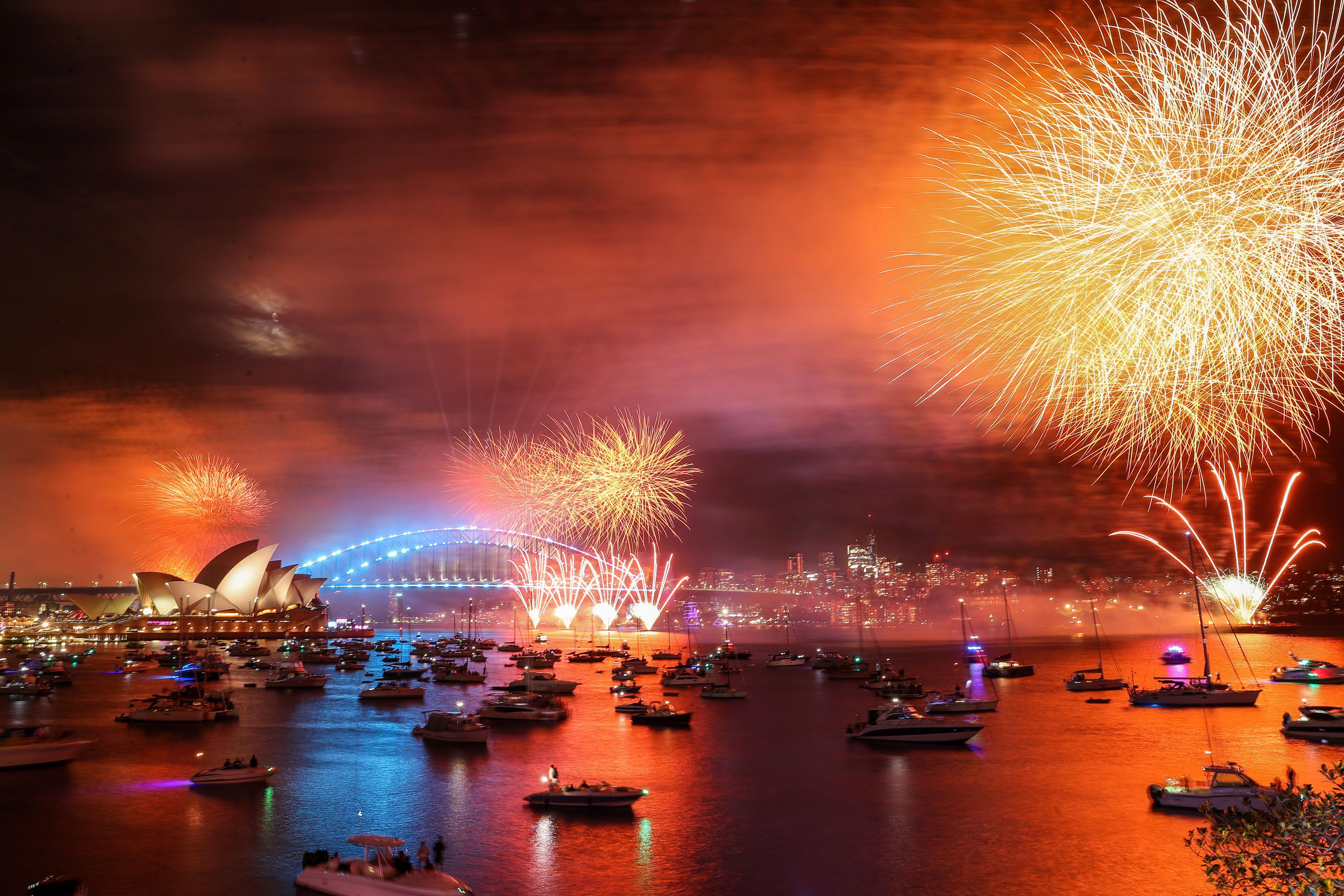 Fireworks light up the sky over Sydney Harbour Bridge during New Year's Eve celebration on January 01, 2023 in Sydney, Australia.