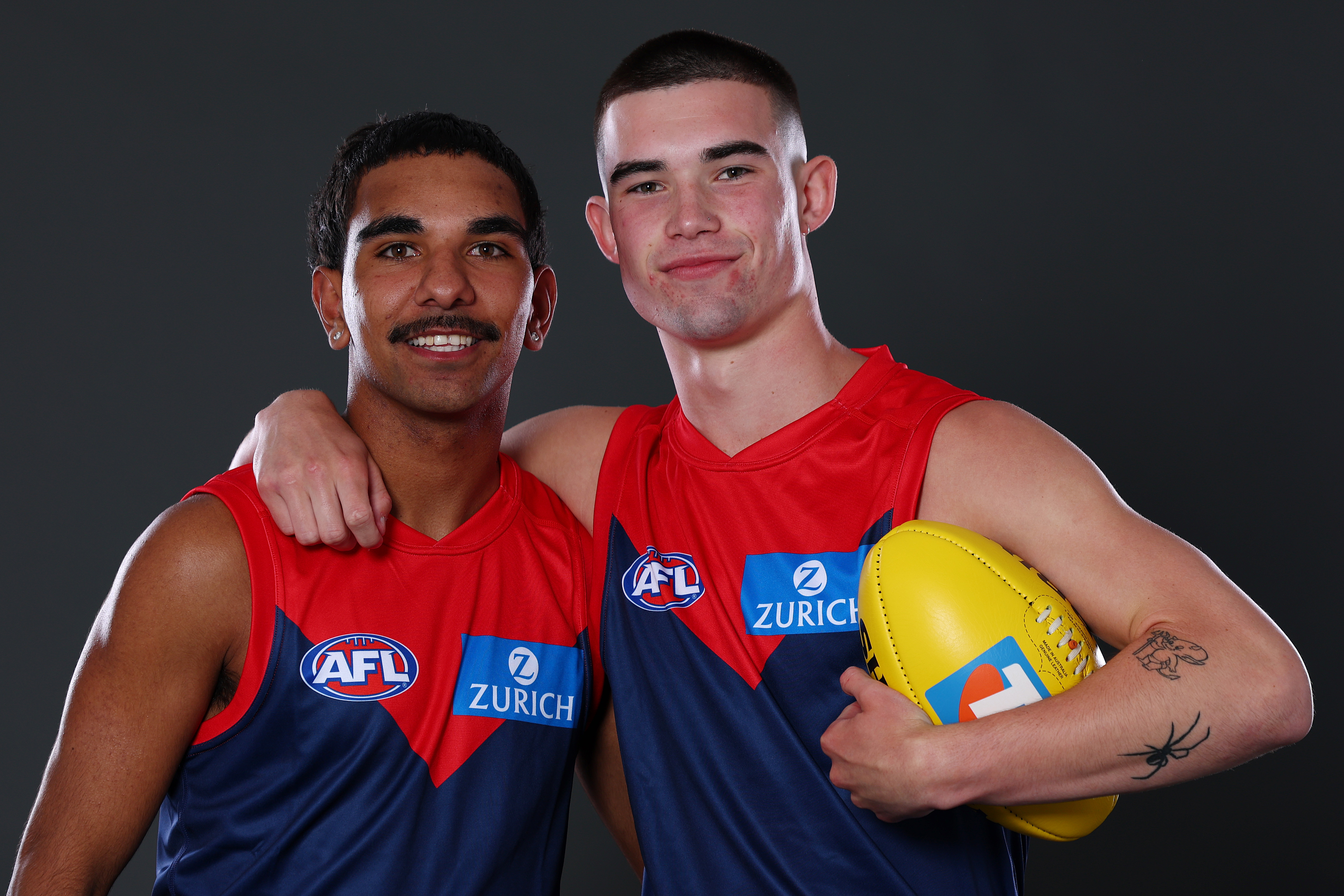 Latrelle Pickett and Xavier Taylor pose after being selected by the Demons as part of the 2025 AFL Draft 