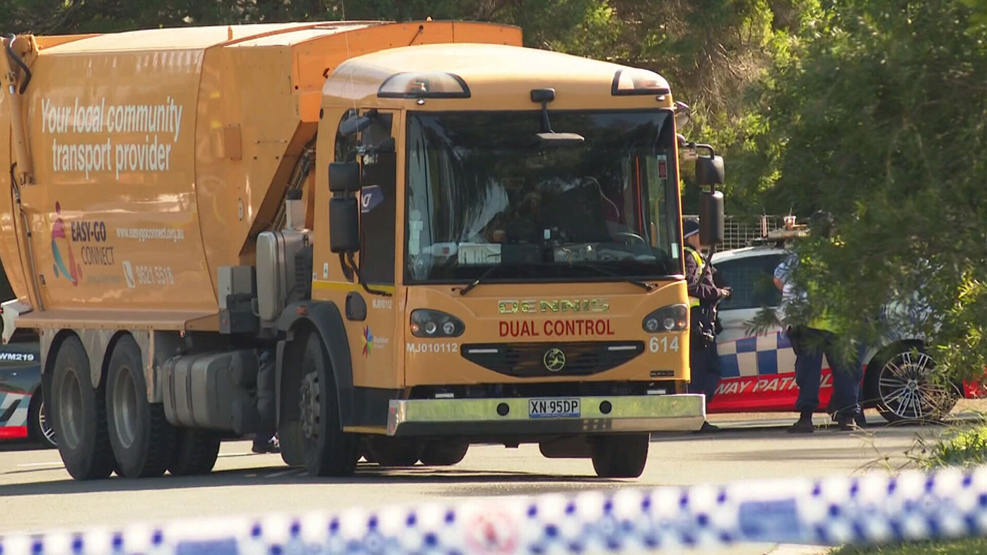 A woman has died in Sydney's west after being struck by a garbage truck. 