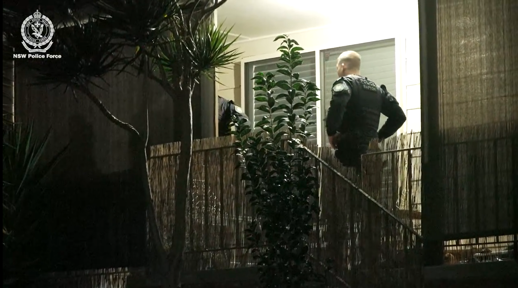 An alleged Rebels bikie member has been charged after police uncovered a video of a caged cat being fatally shot at point-blank range on his phone.