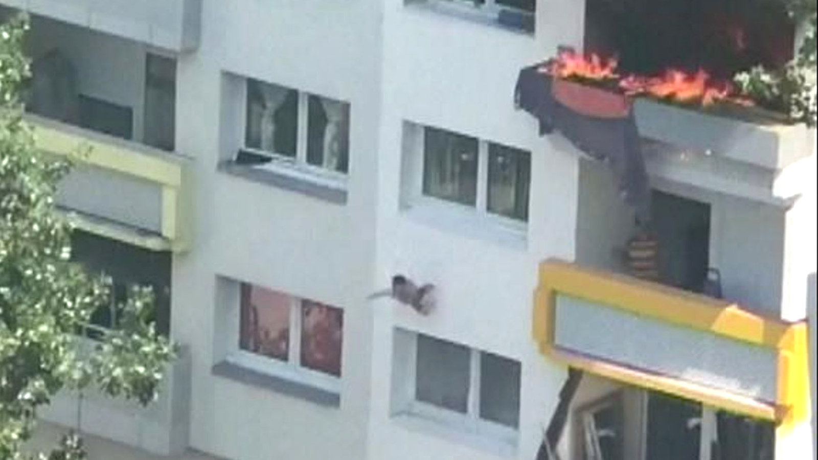 One of the boys falls from the window