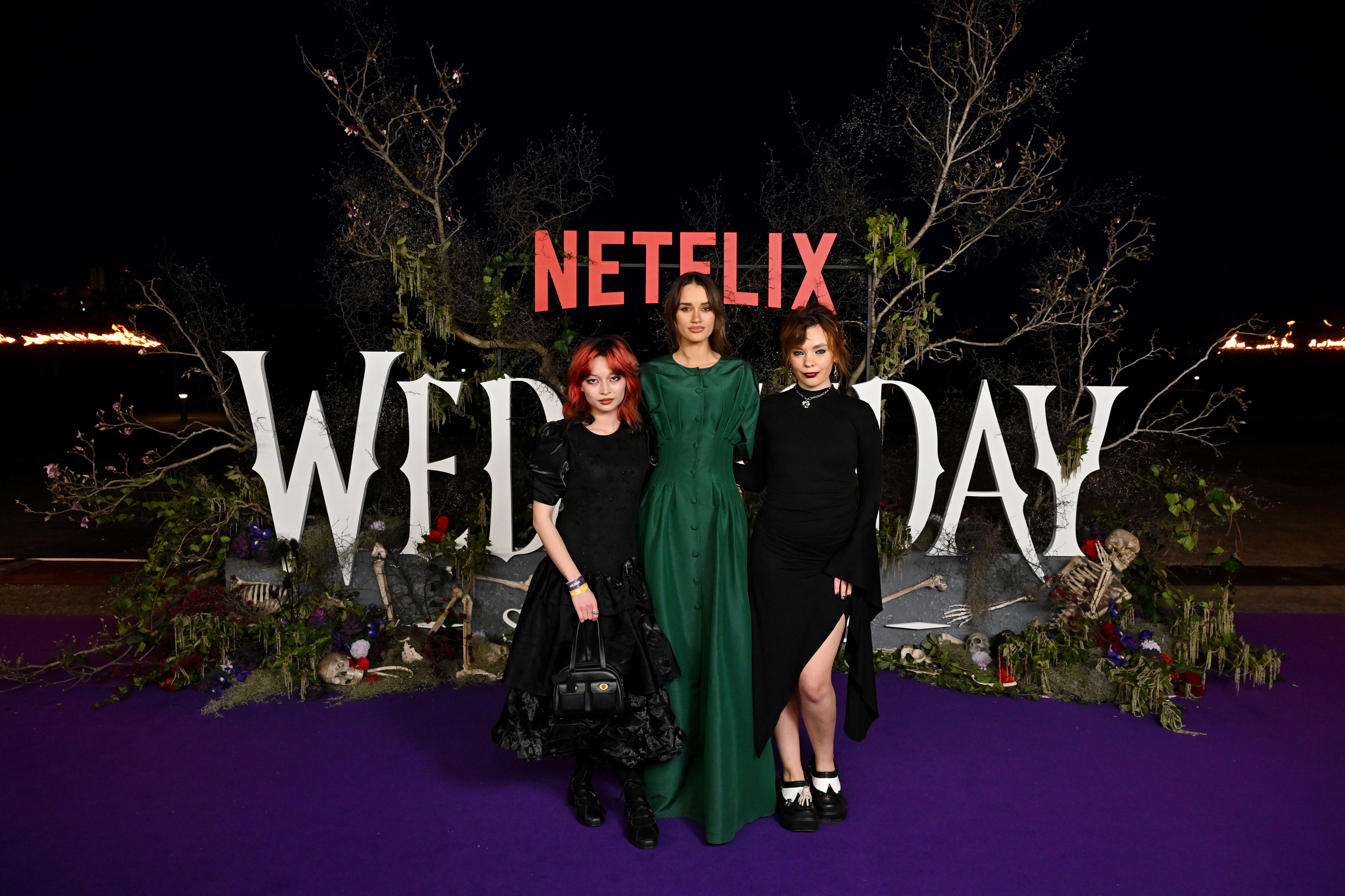 Gemma Chua-Tran, Kylah Day and Chloé Hayden attends the "Wednesday" S2, Part 2 'Wednesday Island Fan Event' on Cockatoo Island on August 16, 2025 in Sydney, Australia. (Photo by Hanna Lassen/Getty Images for Netflix)
