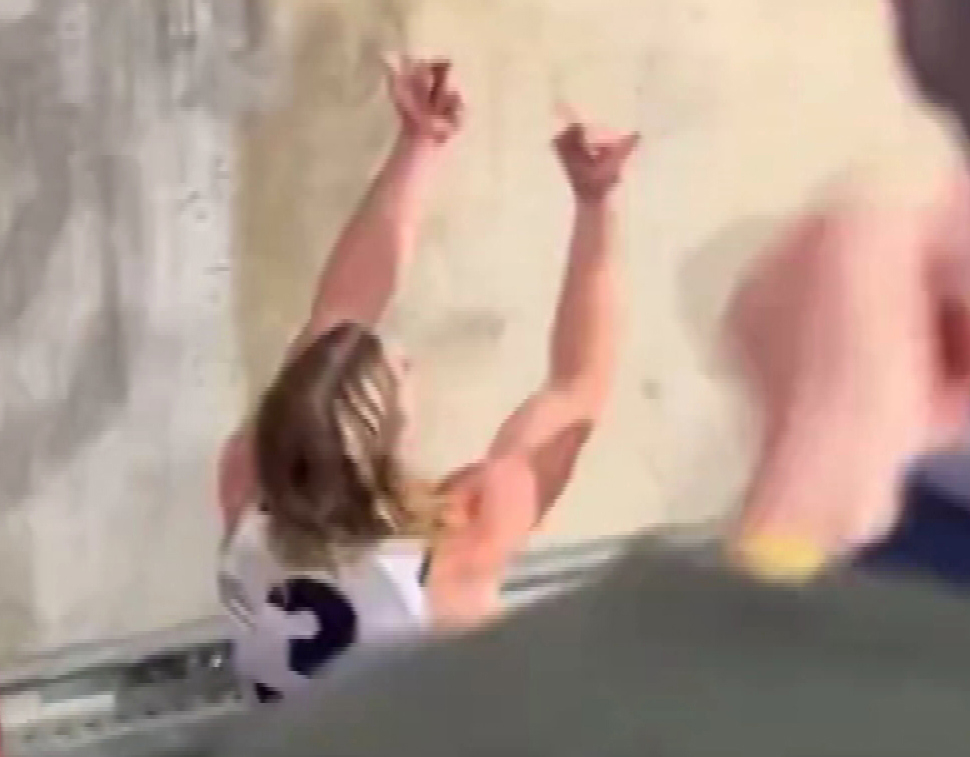Bailey Smith flips a fan the double bird after the Cats' Gather Round win over the Adelaide Crows.