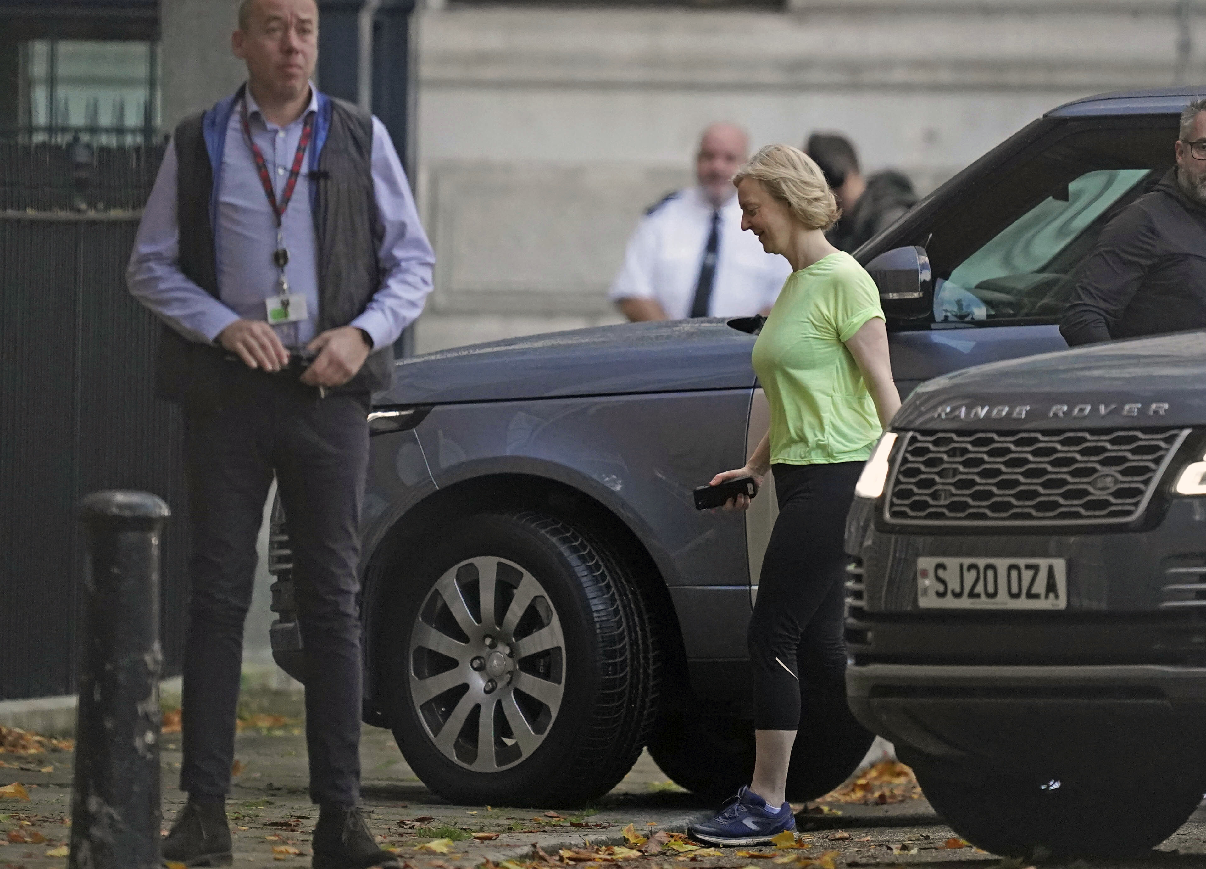 Liz Truss arrives in Downing Street, London, Friday Oct. 21, 2022. British Prime Minister Liz Truss resigned Thursday, bowing to the inevitable after a tumultuous, short-lived term in which her policies triggered turmoil in financial markets and a rebellion in her party that obliterated her authority.