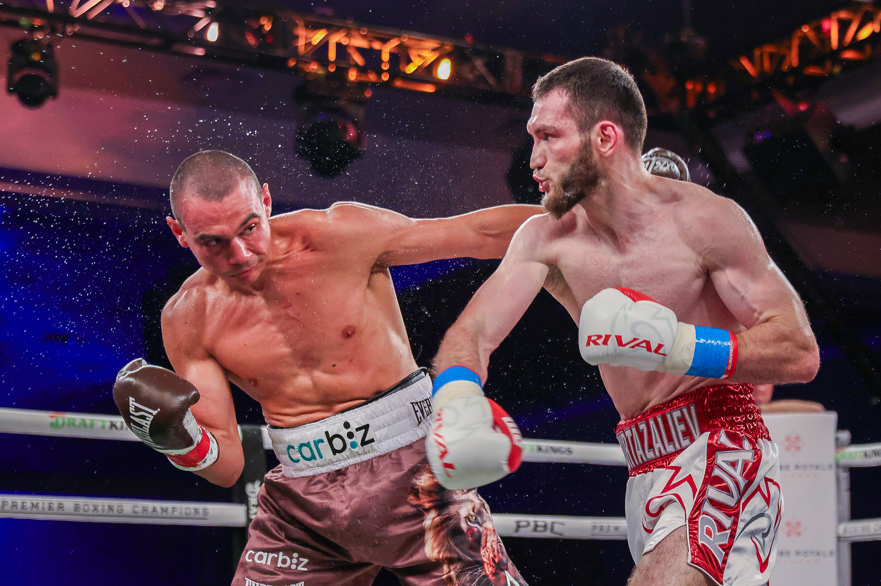 Bakhram Murtazaliev punches Tim Tszyu at Caribe Royale Orlando.