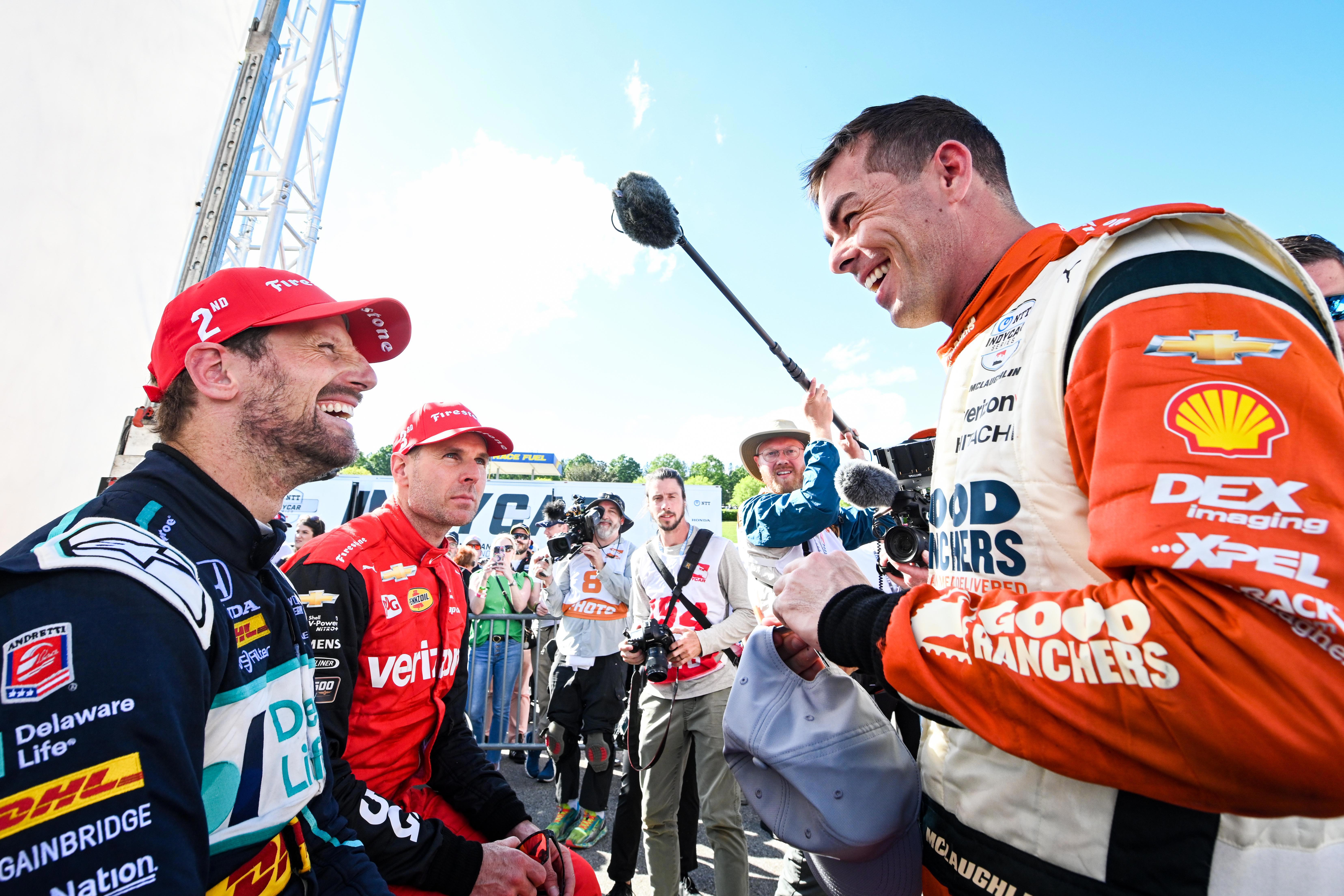 Romain Grosjean (left) with Grand Prix of Alabama winner Scott McLaughlin (right).
