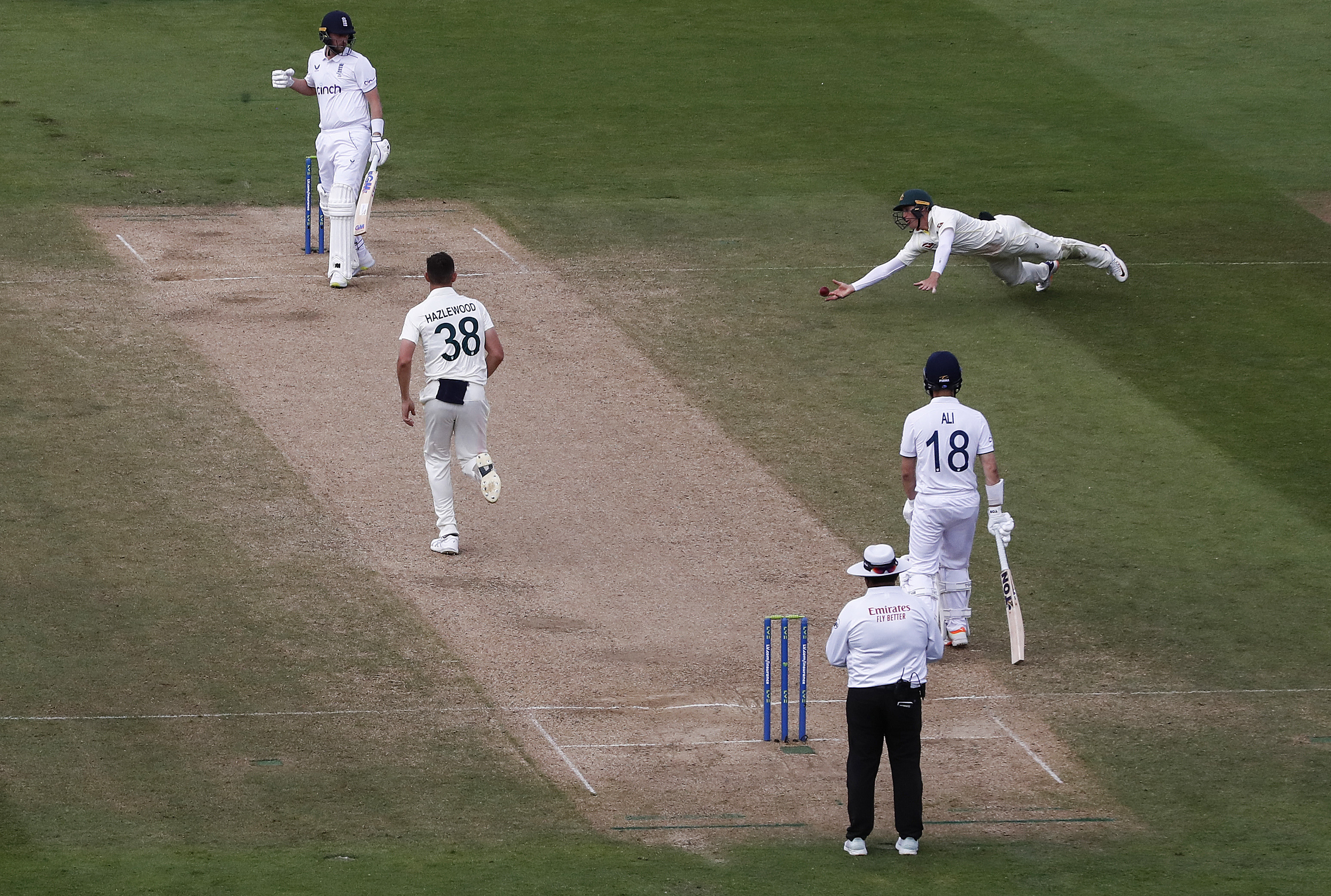 Marnus Labuschagne of Australia attempts unsuccessfully to catch Ollie Robinson of England.