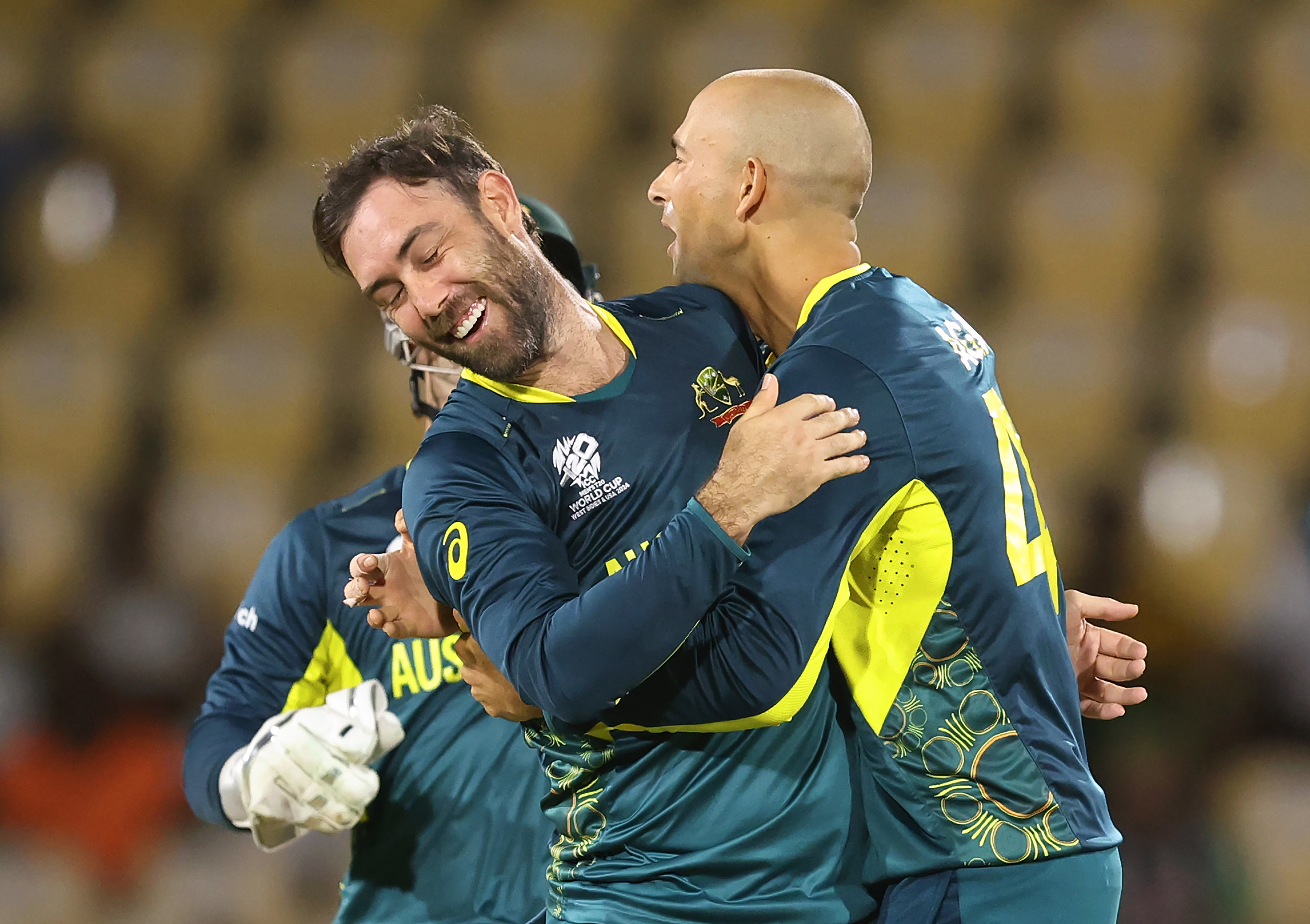 Ashton Agar and Glenn Maxwell celebrate during the ICC Men's T20 Cricket World Cup West Indies & USA 2024 match between Australia and Scotland at  Daren Sammy National Cricket Stadium on June 15, 2024 in Gros Islet, Saint Lucia. (Photo by Robert Cianflone/Getty Images)