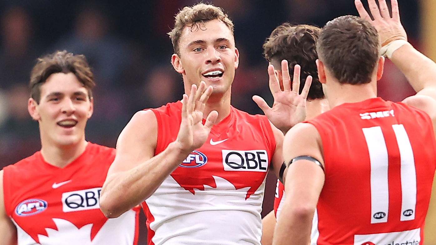 Errol Gulden, left, Will Hayward, centre