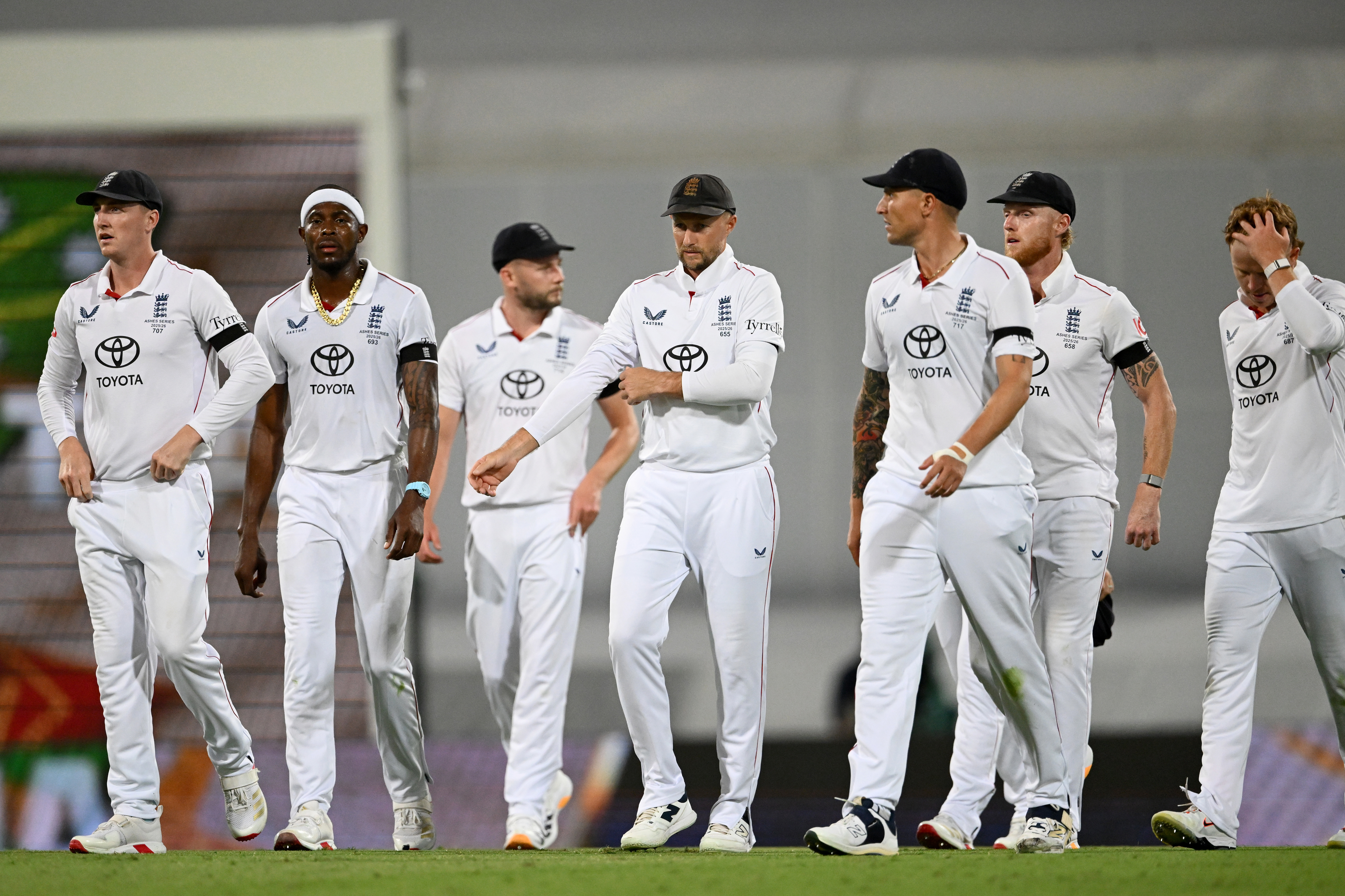 BRISBANE, AUSTRALIA - DECEMBER 07: England leave the field after losing the Second 2025/26 Ashes Series Test Match between Australia and England at The Gabba on December 07, 2025 in Brisbane, Australia. (Photo by Gareth Copley/Getty Images)