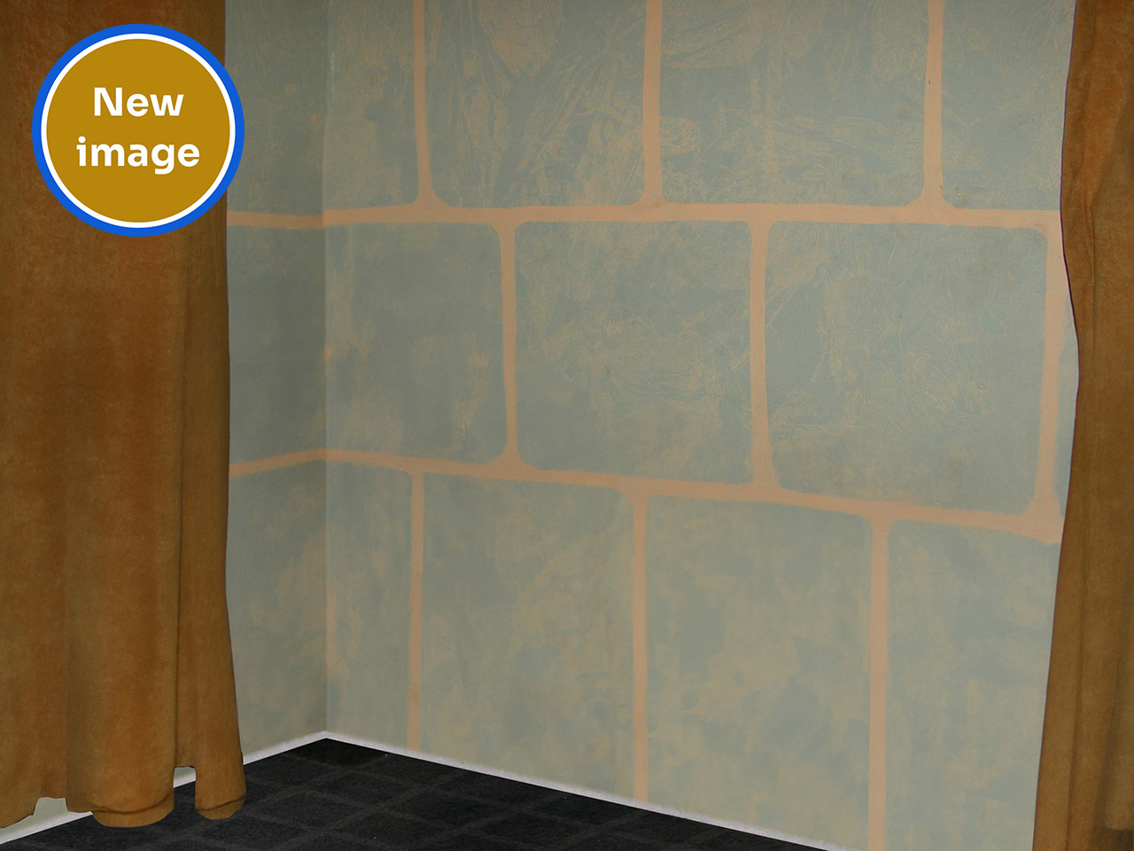 The AFP has released two linked images that feature a "distinctive brick wall pattern" and "yellow curtains" in the hope it will solve cold cases of child abuse.