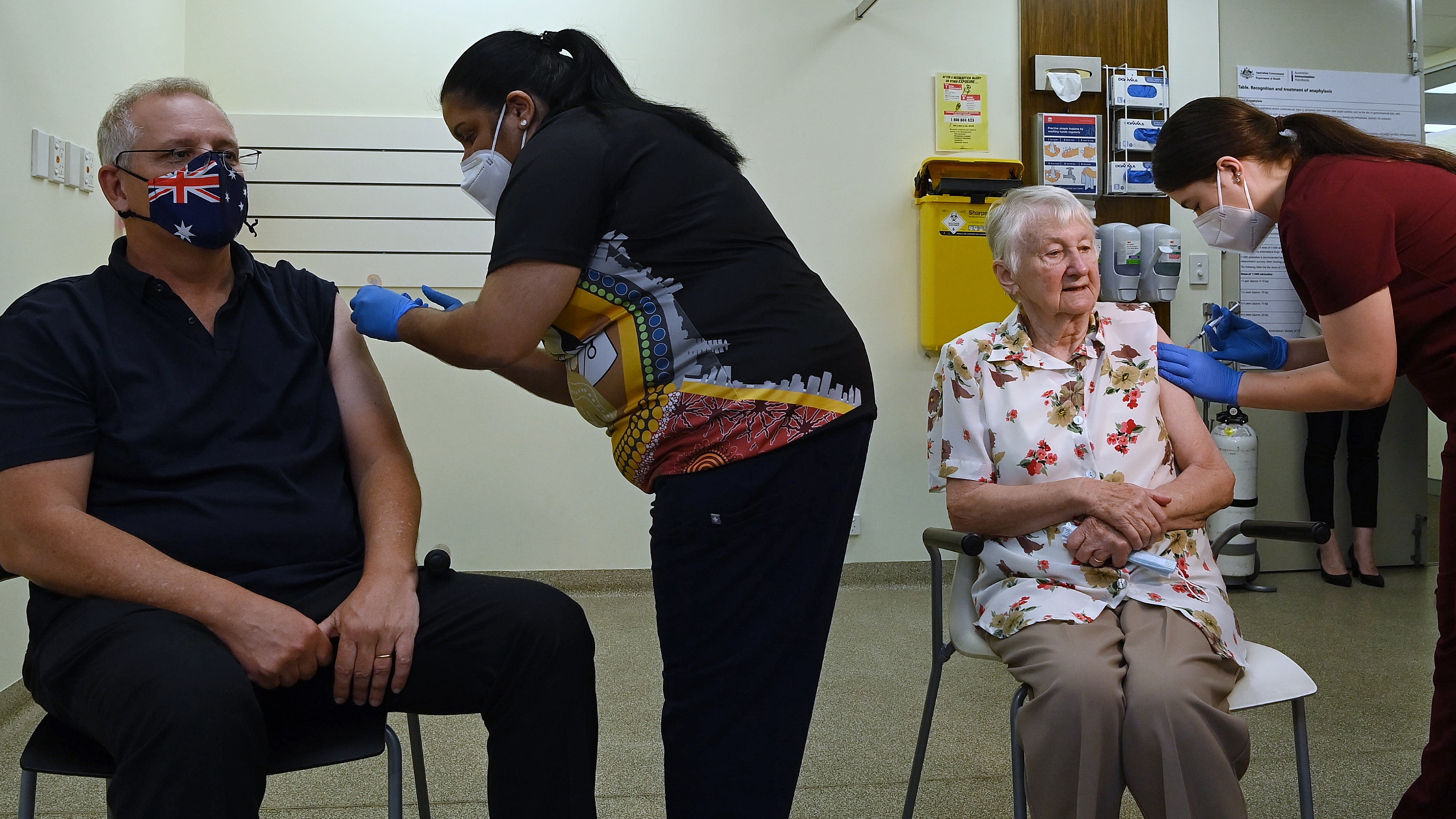 Australian Prime Minister Scott Morrison gets his COVID-19 booster  with Jane Malysiak in Blacktown, NSW.  