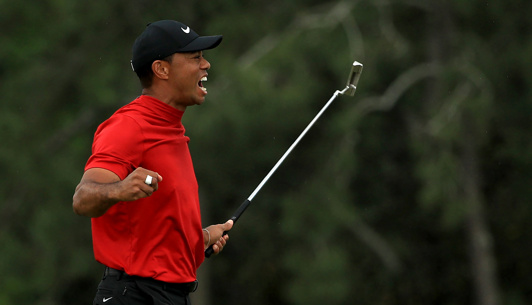 Tiger Woods of the United States celebrates winning the Masters during the final roubnd at Augusta National Golf Club on April 14, 2019 in Augusta, Georgia. (Photo by Mike Ehrmann/Getty Images)
