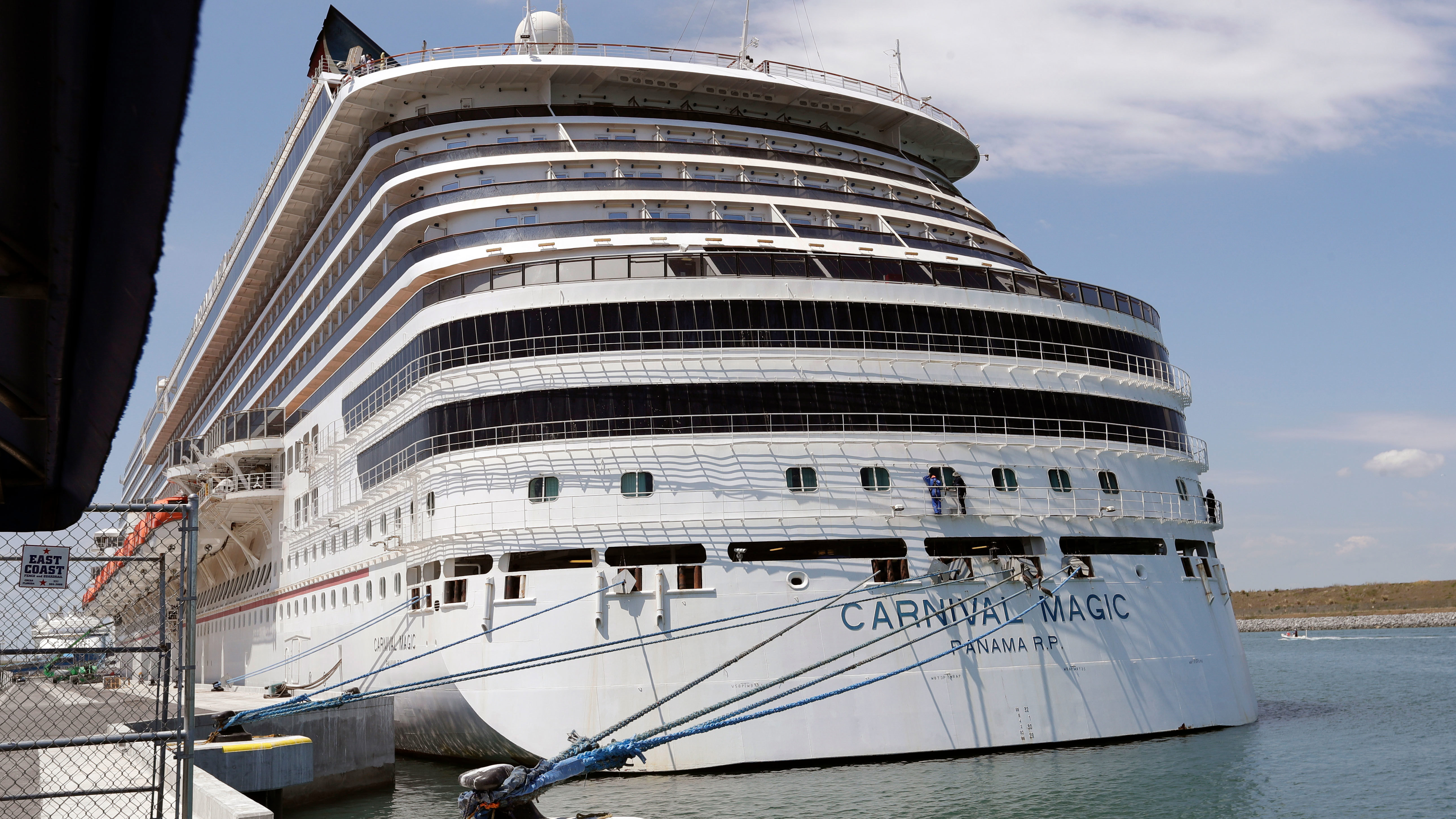 The Carnival cruise line ship Carnival Magic sits docked on April, 2020, in Cape Canaveral, Fla. The US Coast Guard said that it's searching for a man who fell from the cruise ship off the coast of Florida. 