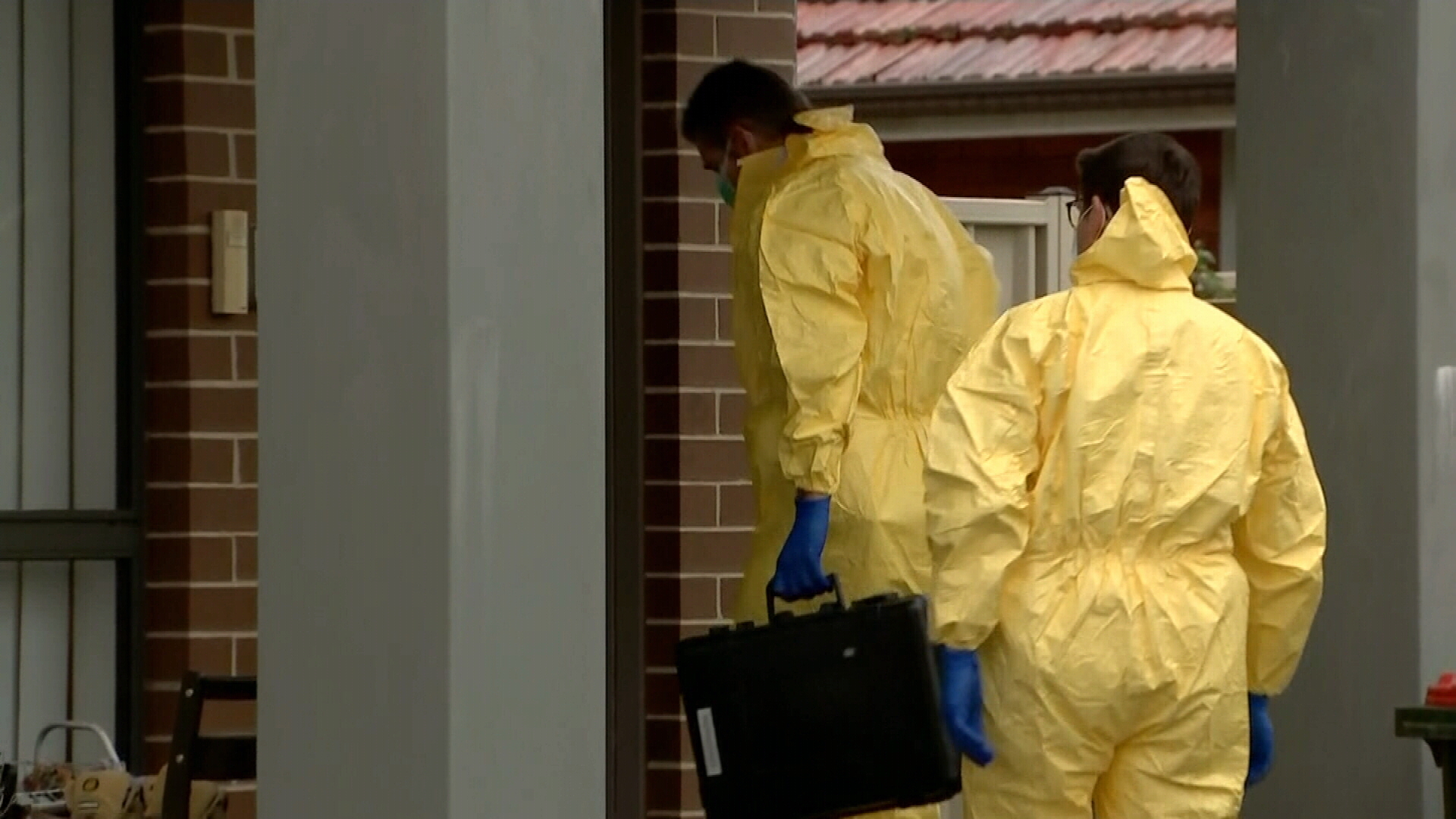 Forensic police at the crime scene in Quakers Hill.