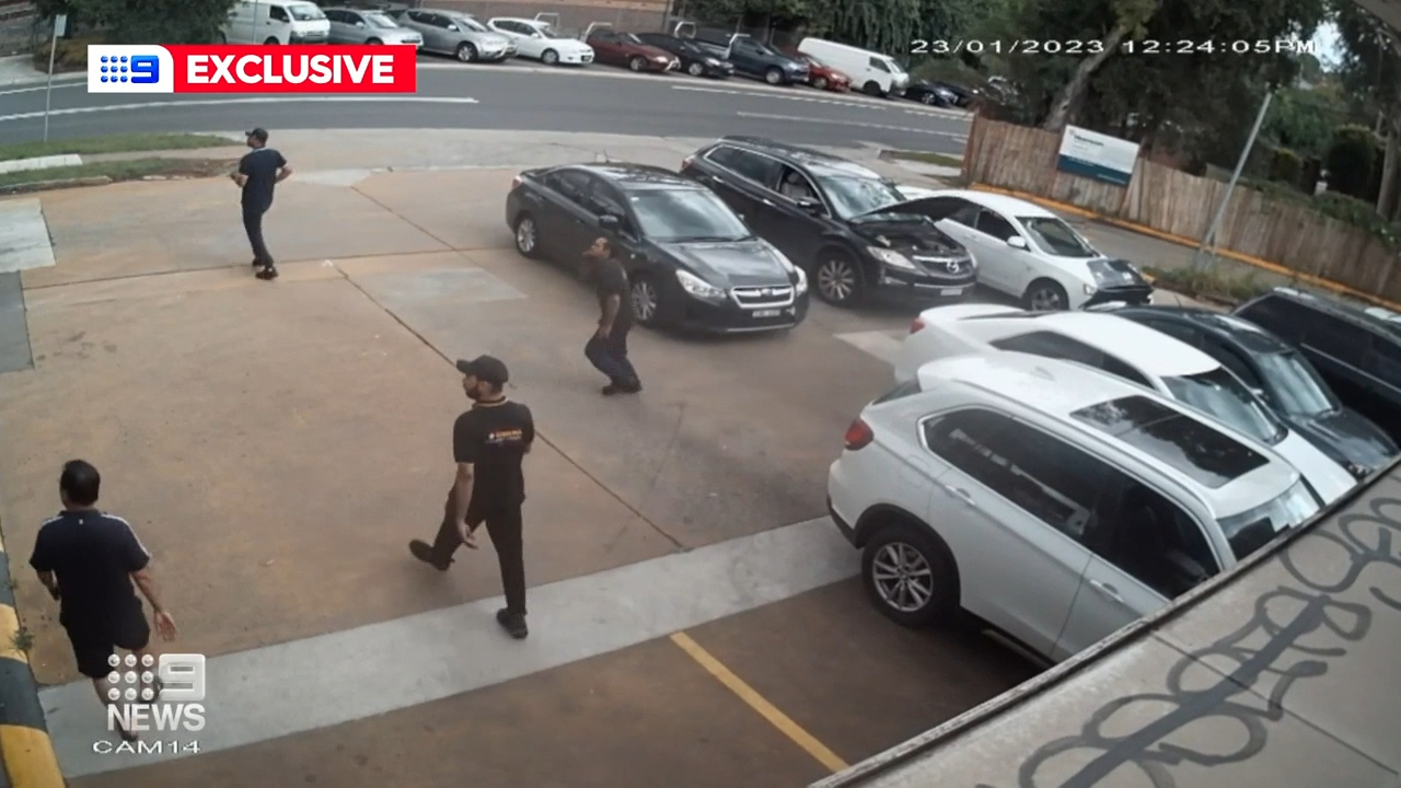 A group of mechanics nearby rushed out to help, as emergency services rushed to the scene.