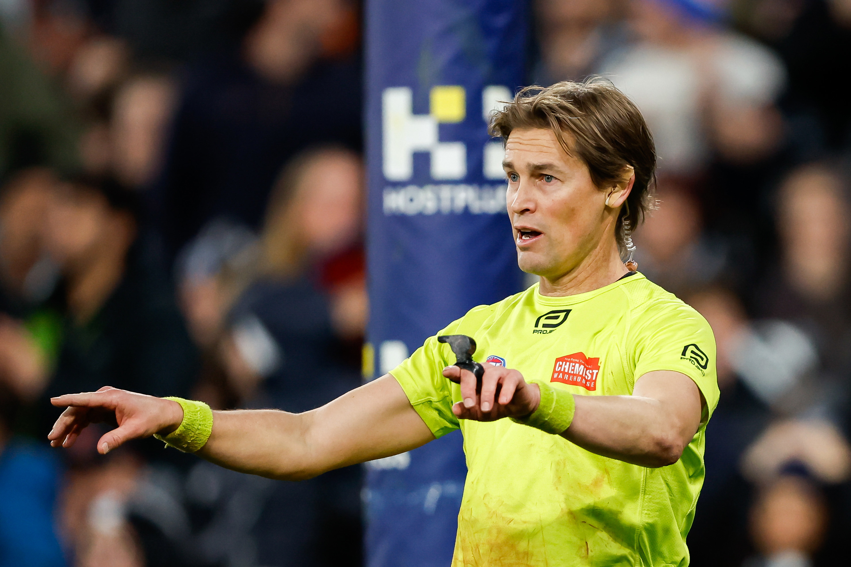 MELBOURNE, AUSTRALIA - AUGUST 12: AFL Field Umpire, Robert Findlay signals for a score review during the 2023 AFL Round 22 match between the Carlton Blues and the Melbourne Demons at Melbourne Cricket Ground on August 12, 2023 in Melbourne, Australia. (Photo by Dylan Burns/AFL Photos via Getty Images)