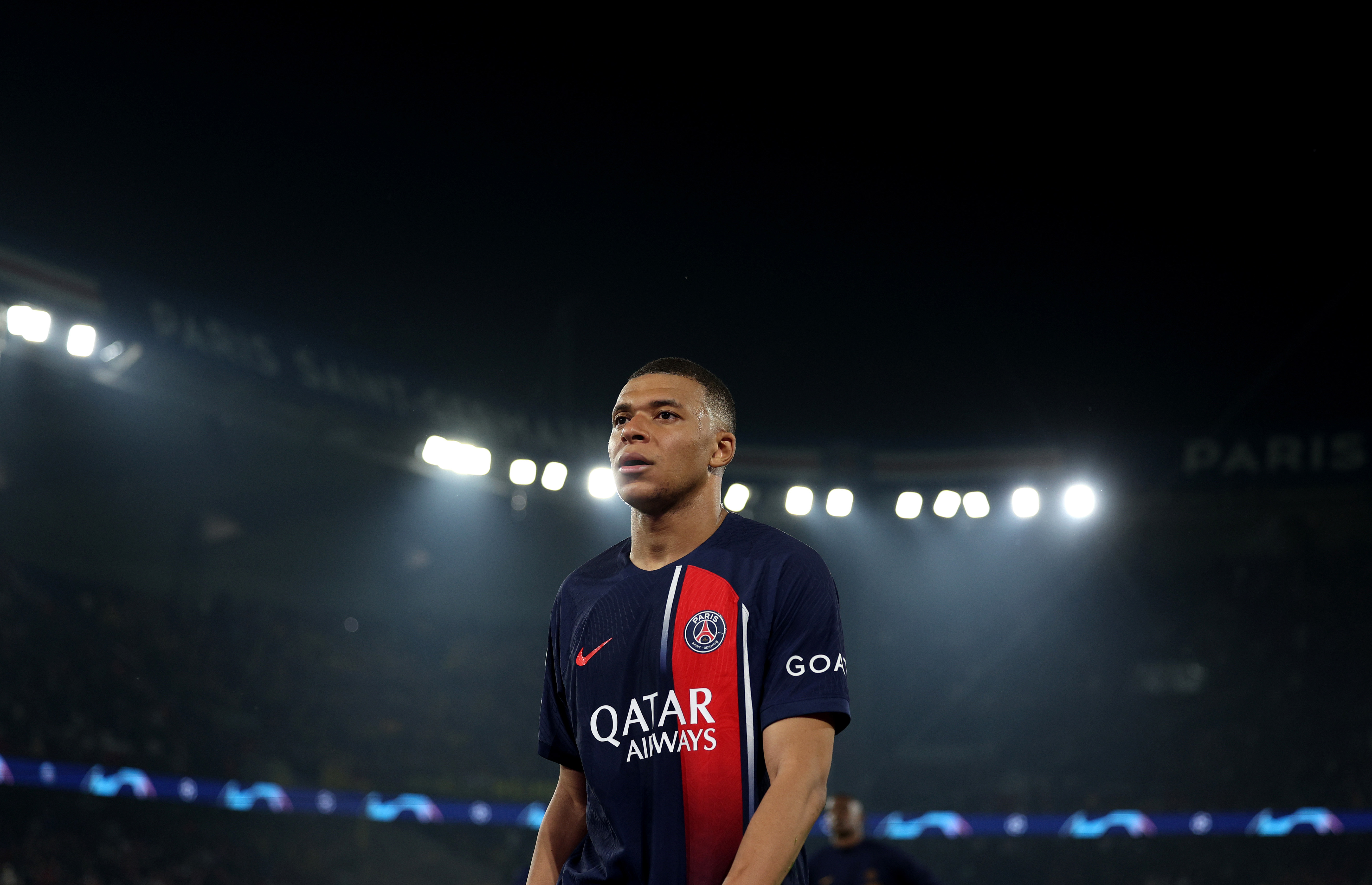 Kylian Mbappe of Paris Saint-Germain looks dejected as he leaves the field after defeat to Borussia Dortmund during the UEFA Champions League semi-final second leg match.