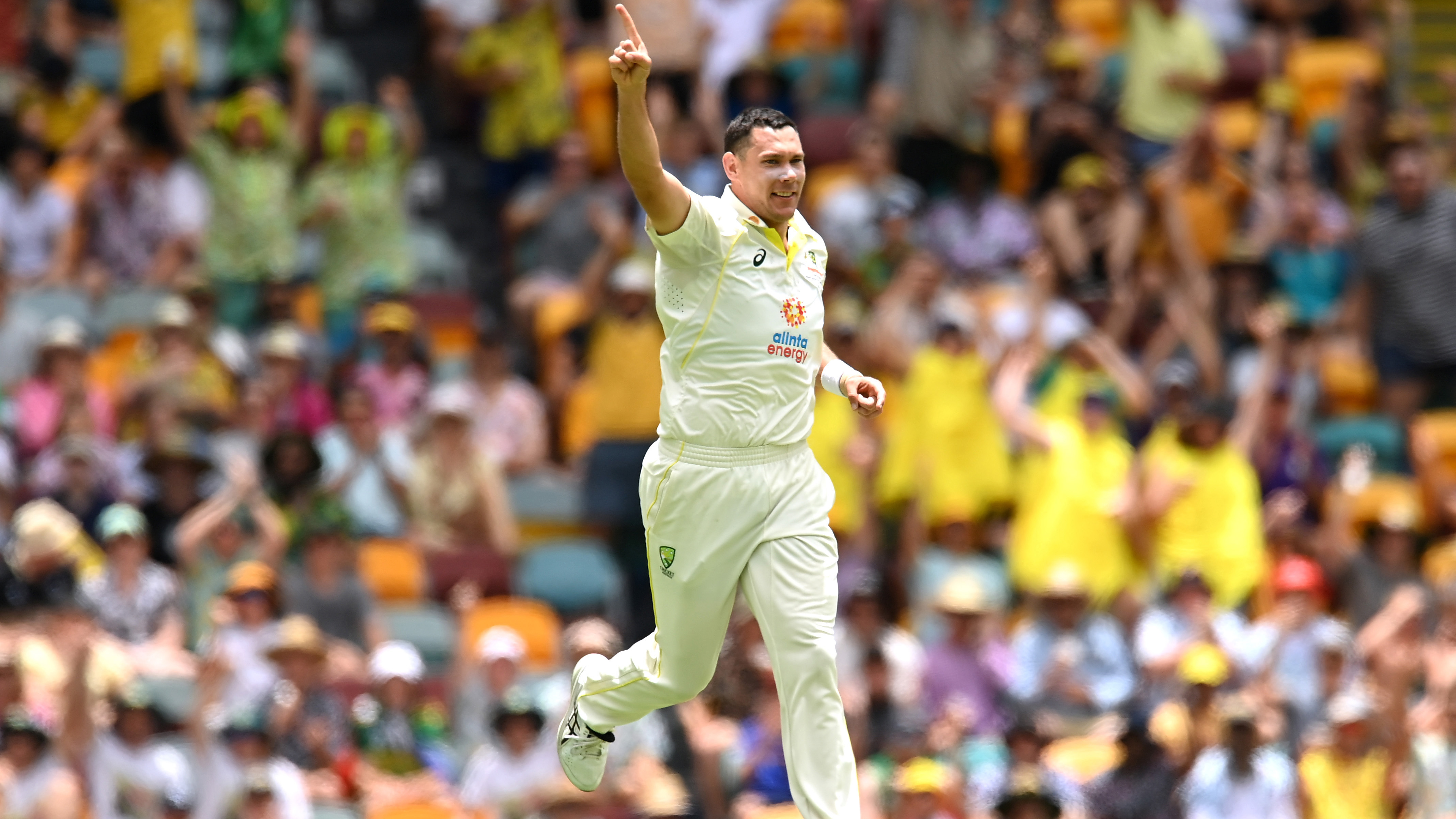 Scott Boland of Australia celebrates taking the wicket of Sarel Erwee of South Africa for 10 runs during day one of the First Test match between Australia and South Africa at The Gabba on December 17, 2022 in Brisbane, Australia. (Photo by Albert Perez/Getty Images)