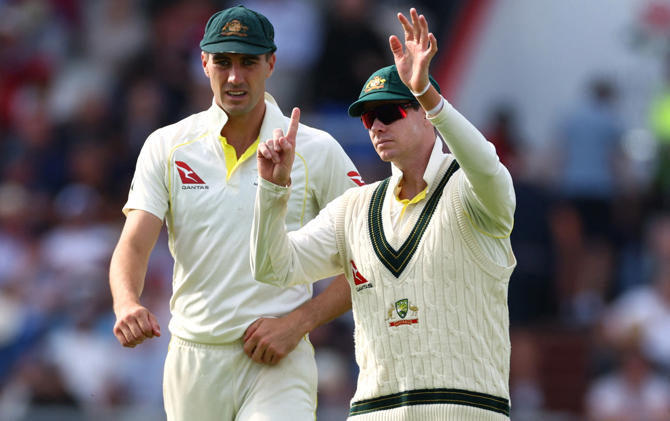 Australia's Steve Smith with captain Pat Cummins at Old Trafford.