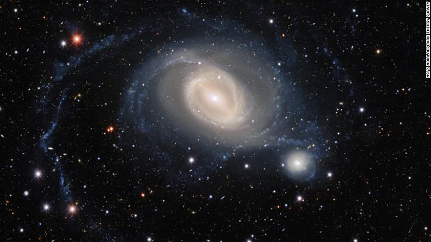 Two galleries dance in this image from the Dark Energy Camera.