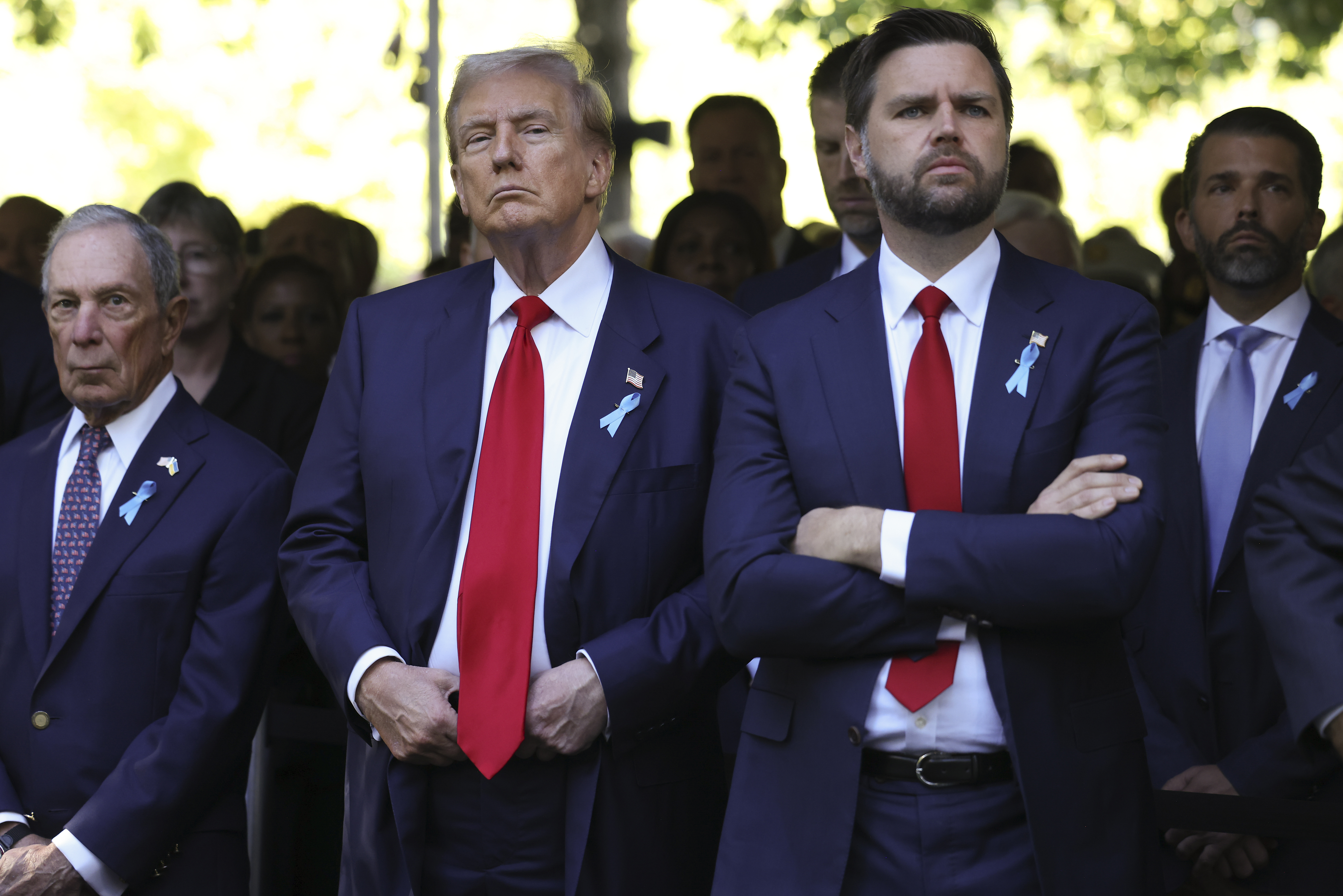 L-R: Michael Bloomberg, Republican presidential nominee former US President Donald Trump and Republican vice presidential nominee Sen. JD Vance