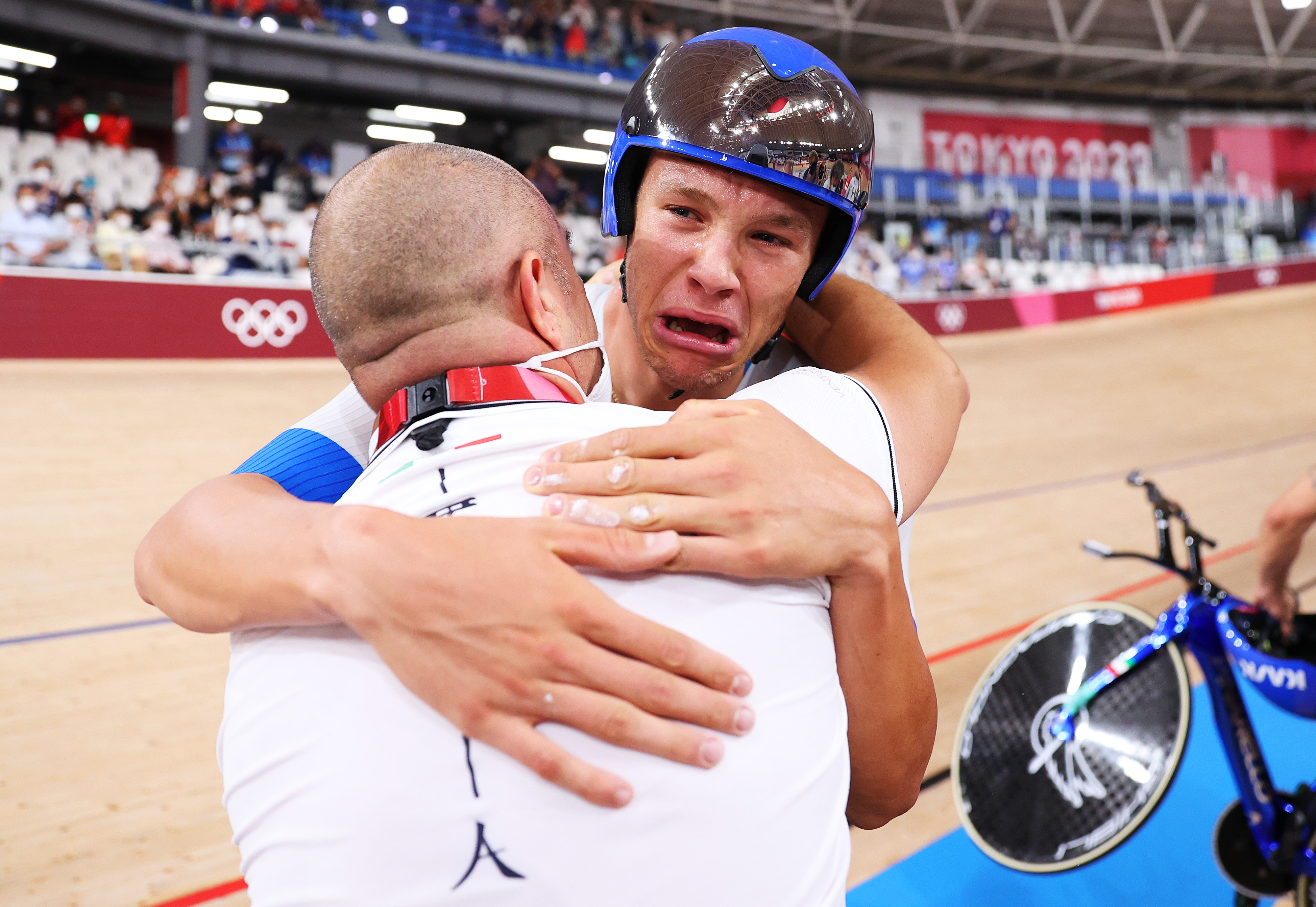Italian Jonathan Milan in tears after winning team pursuit gold.