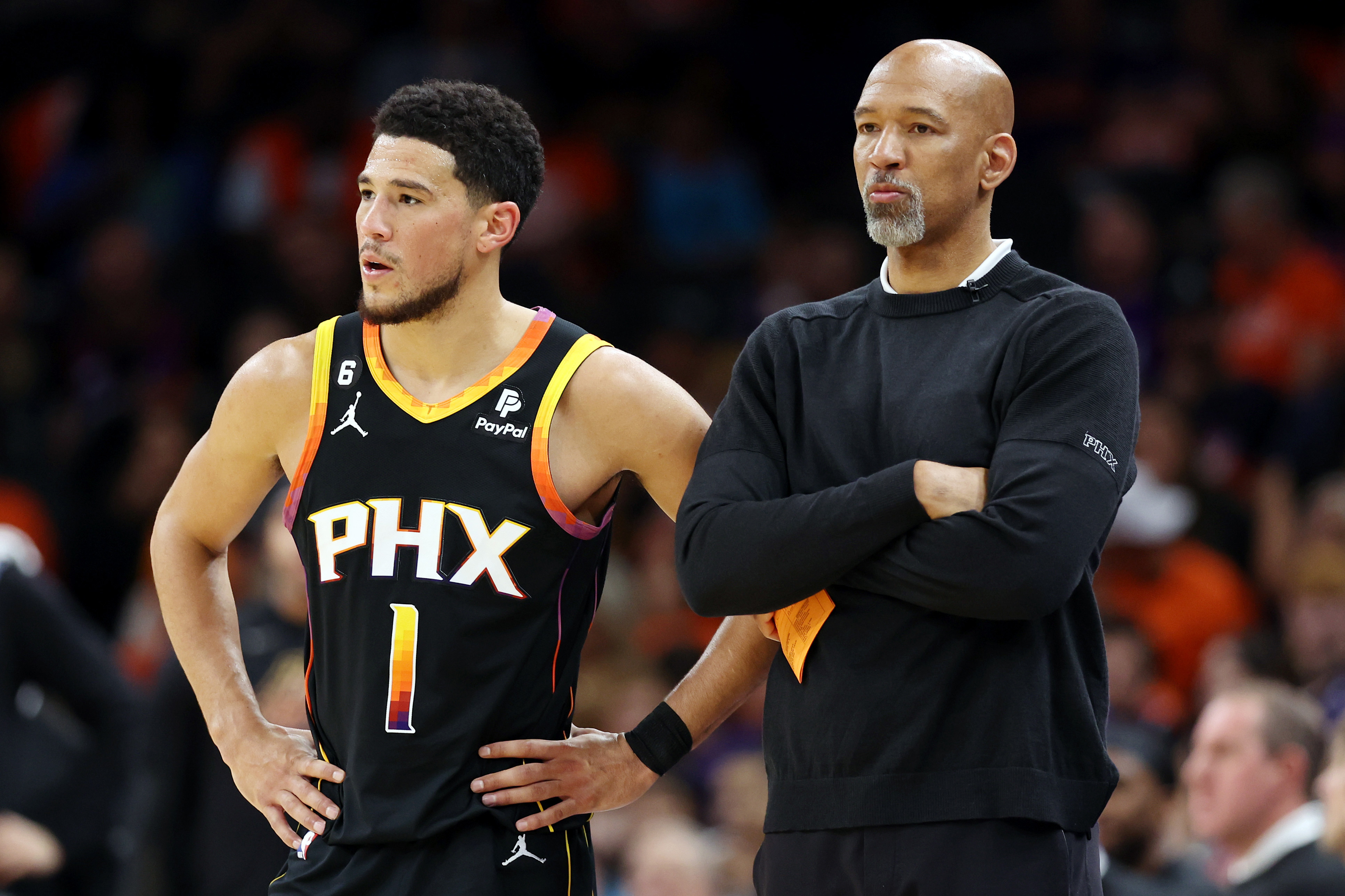 Devin Booker #1 stands with head coach Monty Williams of the Phoenix Suns during the second quarter against the Denver Nuggets in game six of the Western Conference Semifinal Playoffs at Footprint Center on May 11, 2023 in Phoenix, Arizona.