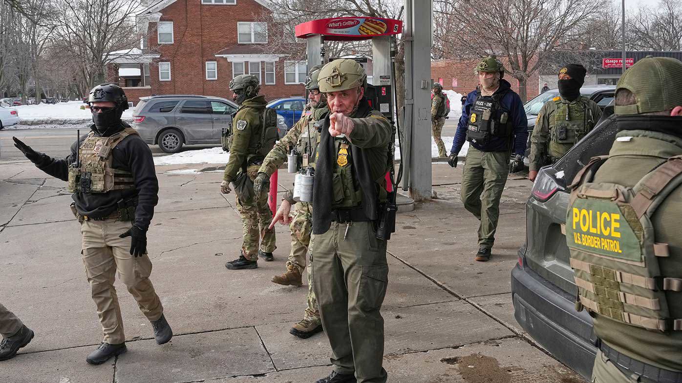 Greg Bovino shouts at members of the media in Minneapolis.