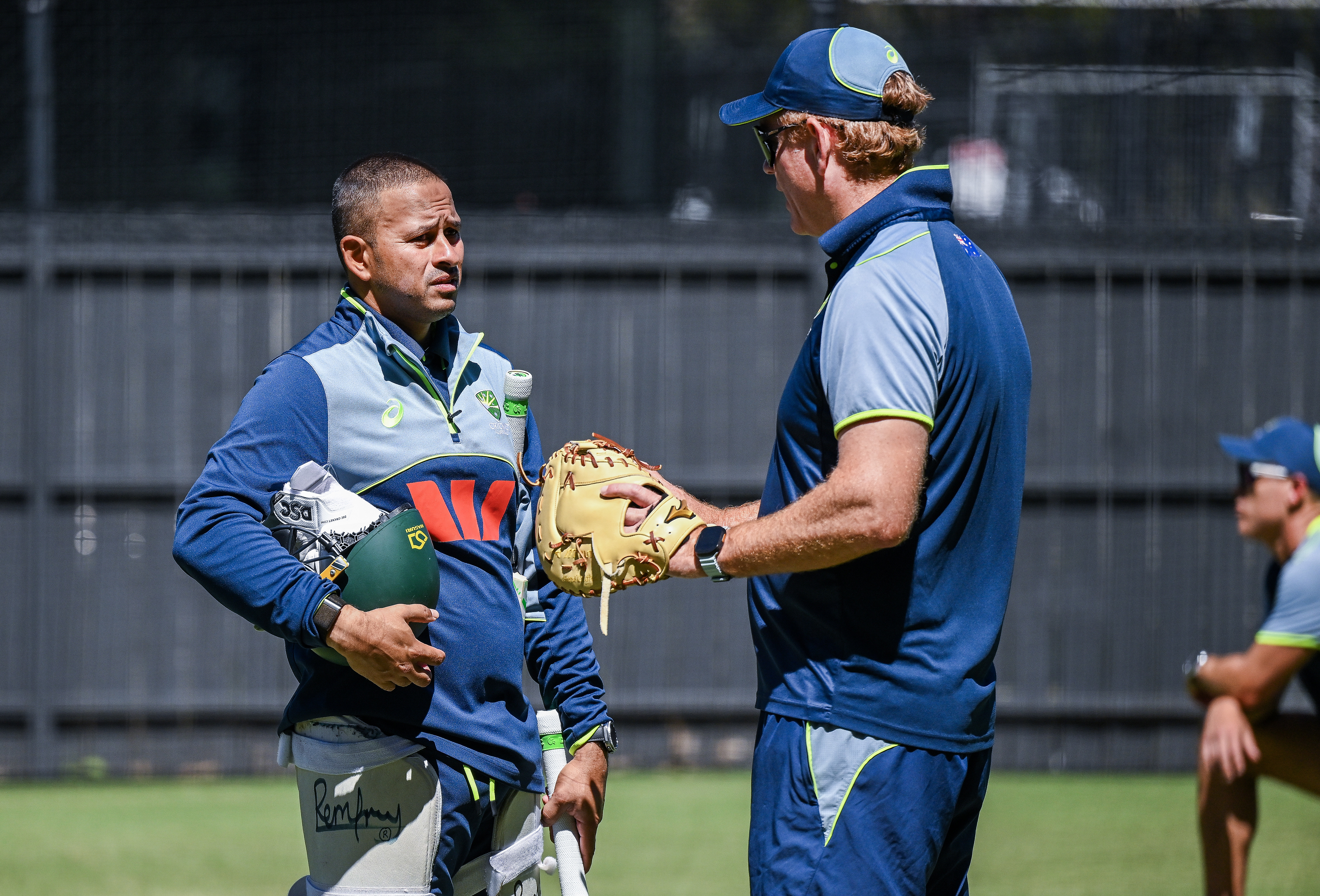 ADELAIDE, AUSTRALIA - DECEMBER 16: Usman Khawaja of Australia chats Andrew McDonald Head coach of Australia during an Australia nets session at Adelaide Oval on December 16, 2025 in Adelaide, Australia. (Photo by Mark Brake/Getty Images)
