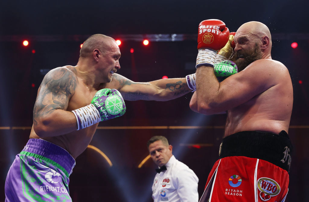 Oleksandr Usyk punches Tyson Fury during the IBF, IBO, WBA, WBC and WBO Undisputed World Heavyweight titles' fight between Oleksandr Usyk and Tyson Fury.