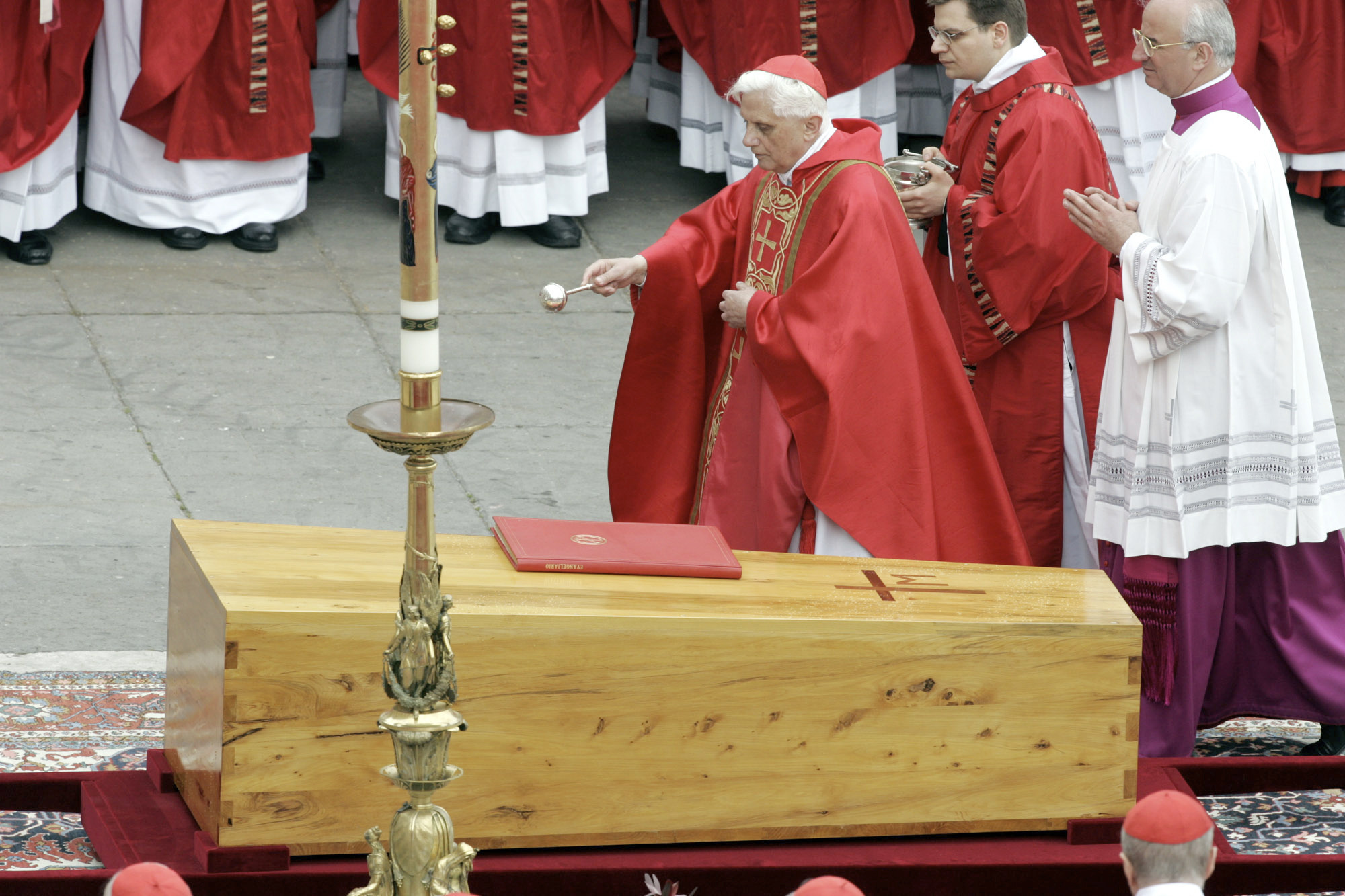 Cardinal Joseph Ratzinger blesses the coffin containing the body of Pope John Paul II during the funeral mass in St. Peter's Square at the Vatican on April 8, 2005. 