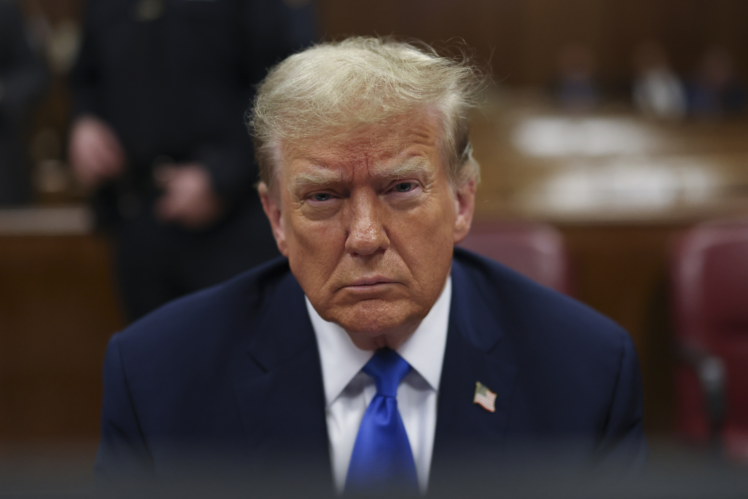 Former US President Donald Trump awaits the start of proceedings during jury selection at Manhattan criminal court, Thursday, April 18, 2024 in New York. 
