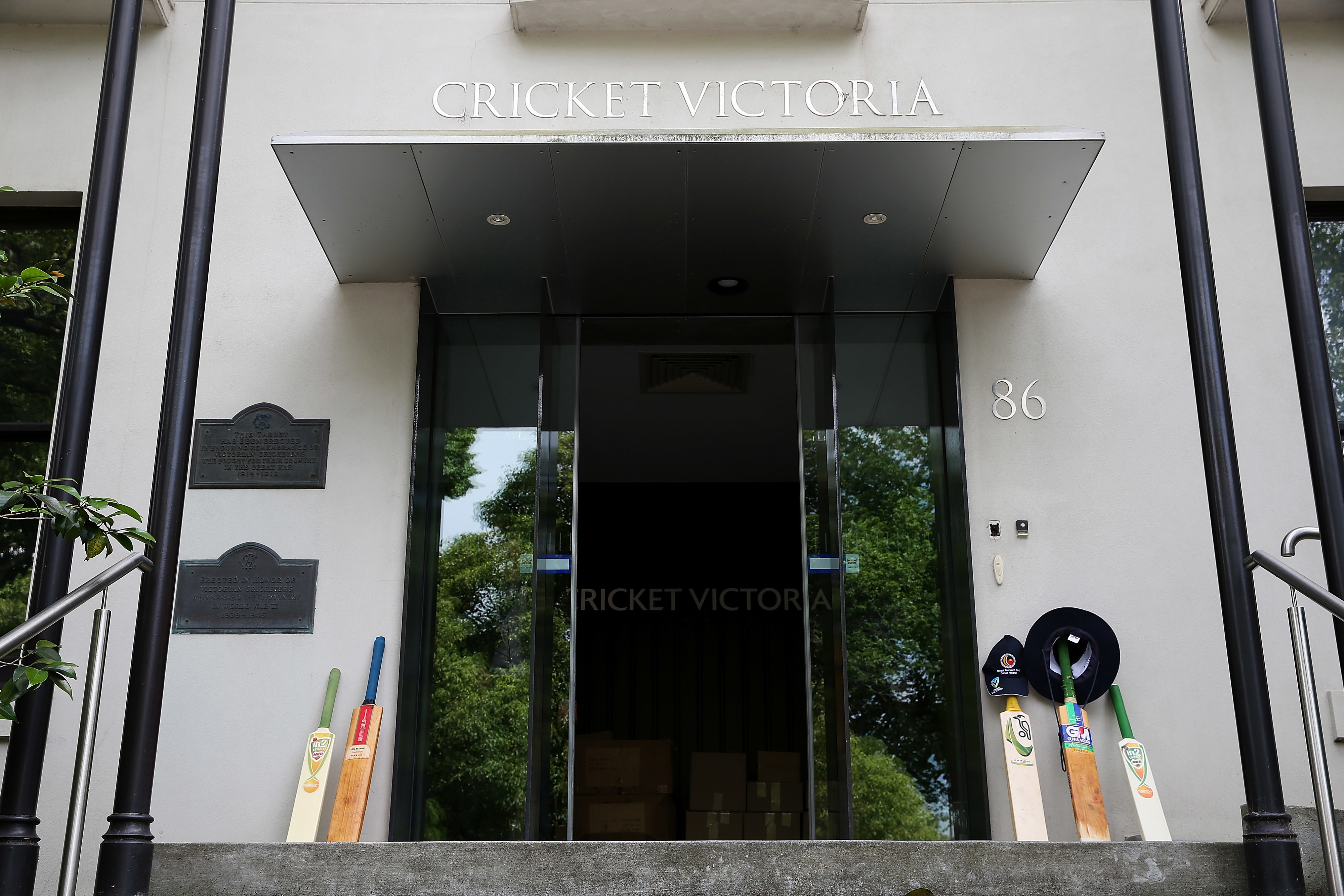 A cricket bat is seen outside the MCG as part of the #putoutyourbat twitter campaign after the tragic death of Australian cricketer Phil Hughes at Melbourne Cricket Ground on November 28, 2014 in Melbourne, Australia.