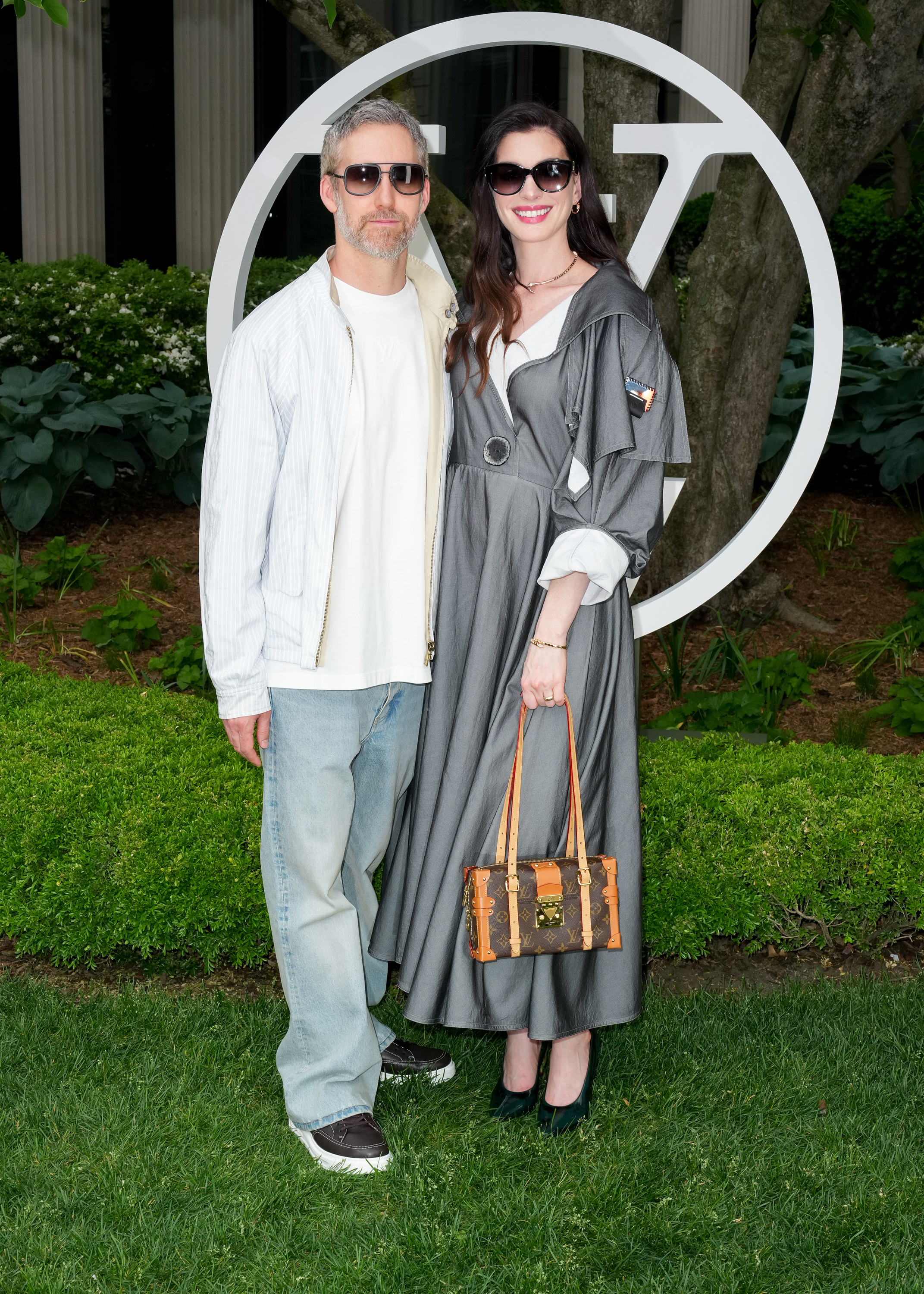 Adam Shulman and Anne Hathaway at the Louis Vuitton 2027 Cruise Collection Show on May 20, 2026 in New York, New York. (Photo by John Nacion/WWD via Getty Images)