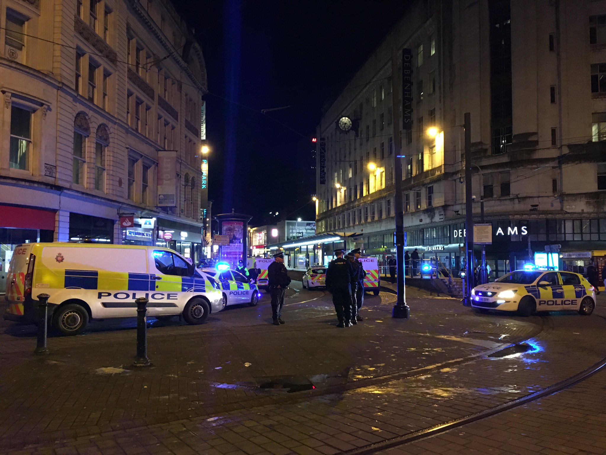 Two people have been injured after a stabbing attack outside a busy department store in the UK overnight.