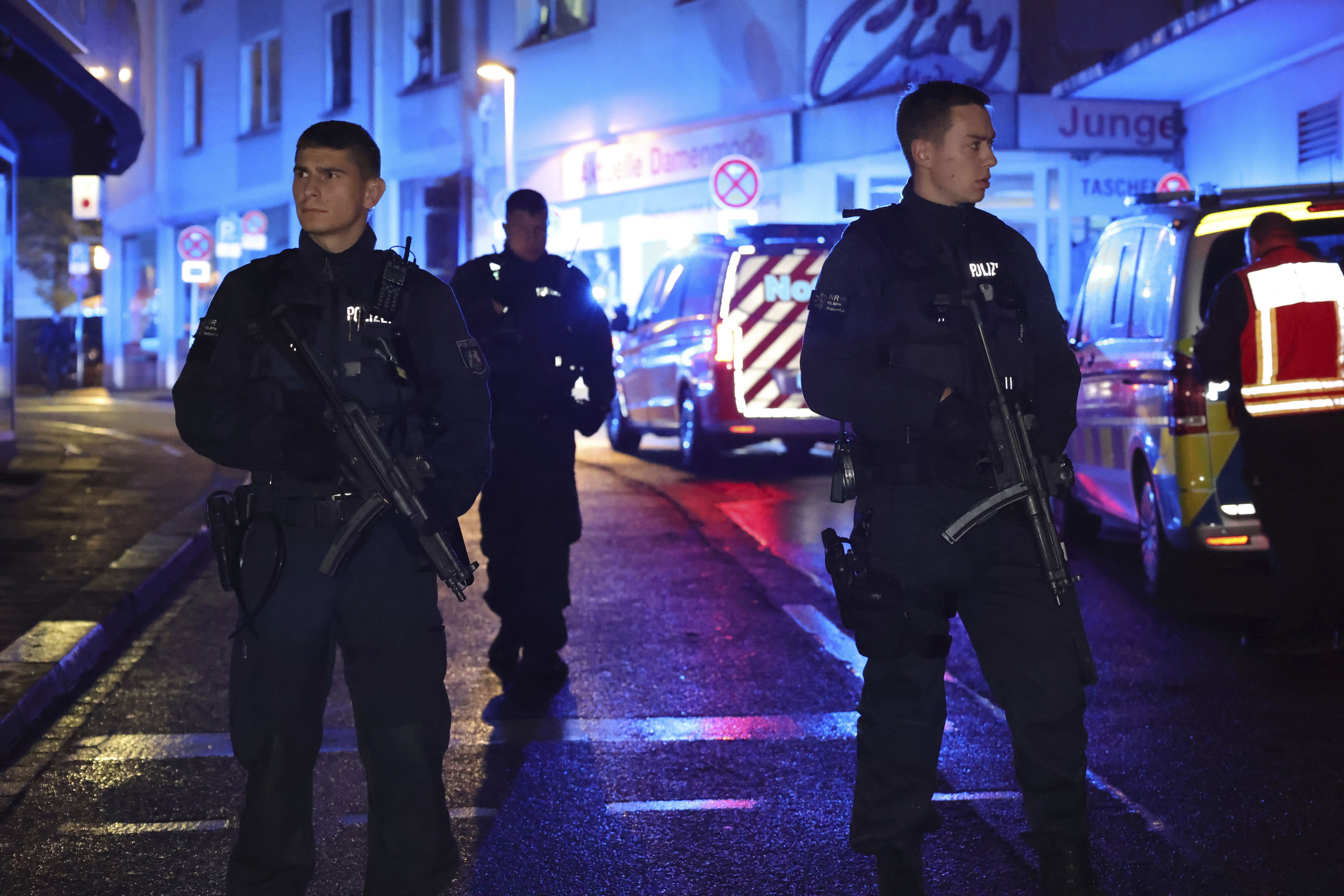 Police and ambulances near the scene where people were killed and injured in an attack at a festival in Solingen, western Germany, the German dpa news agency reported, Friday, Aug. 23, 2024.