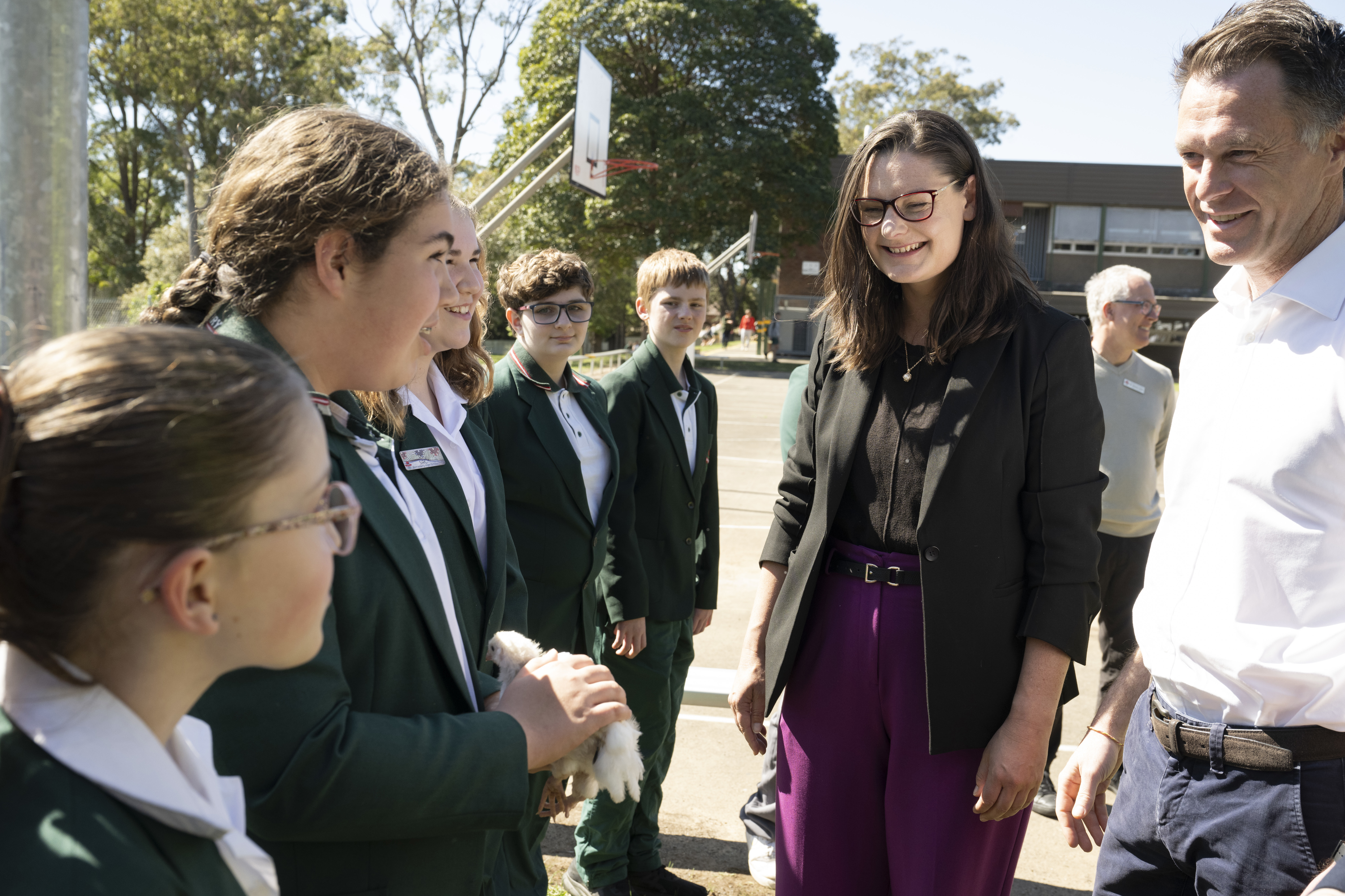Labor Candidate for Kiama Katelin McInerney, and NSW Premier Chris Minns visit Bomaderry High School where they see the school's small farm, the day before the Kiama By-election in NSW. 12 September 2025 Photo: Janie Barrett