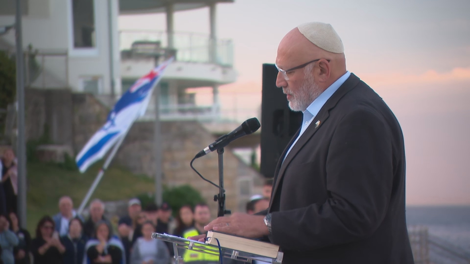 Members of Sydney's Jewish community gathered at Bondi Beach on the morning of October 7.