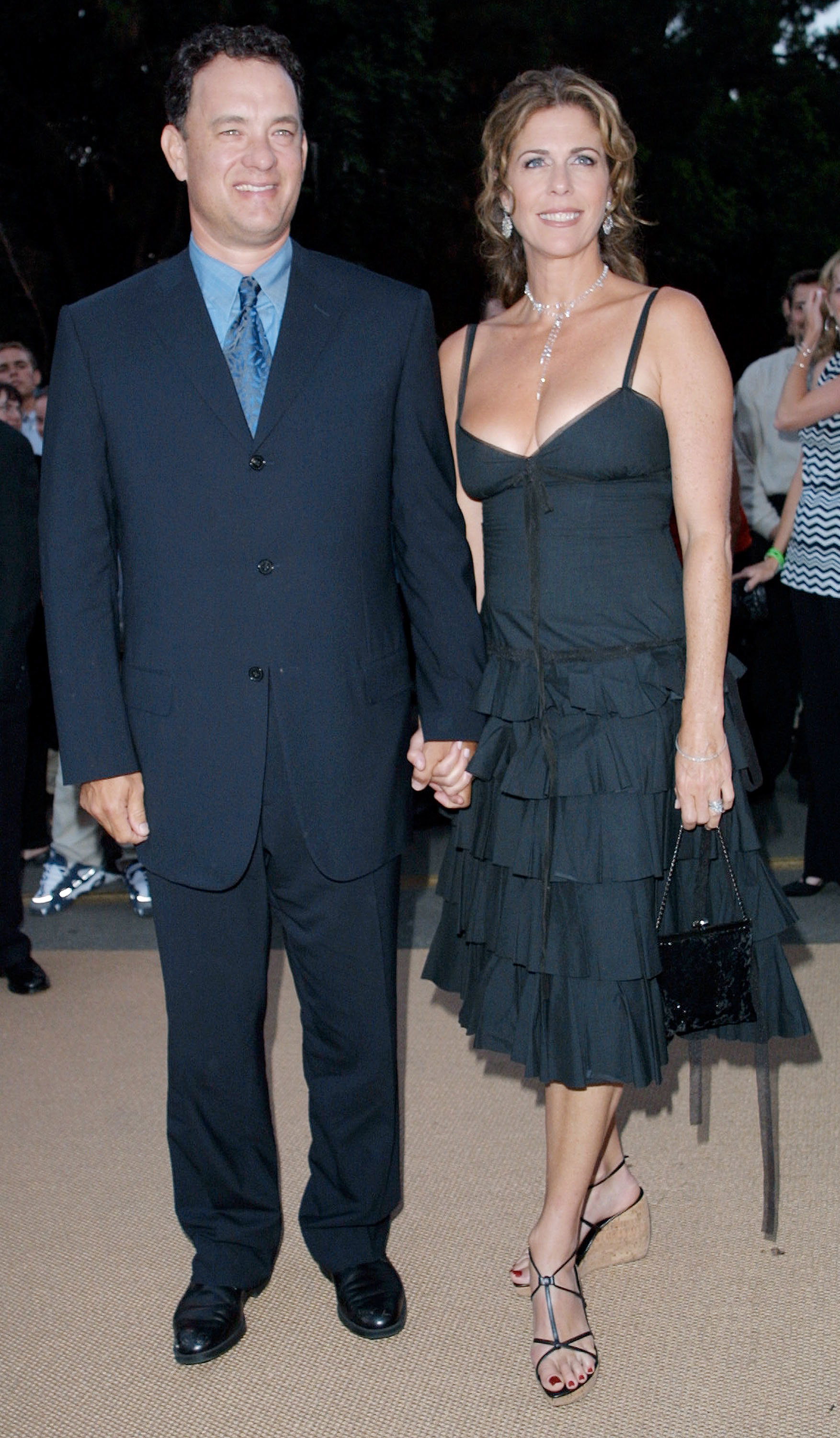 393793 03: Actor/producer Tom Hanks (L) and his wife Rita Wilson attend the film premiere of "Band Of Brothers" August 29, 2001 Los Angeles, CA. (Photo by Frederick M. Brown/Getty Images)