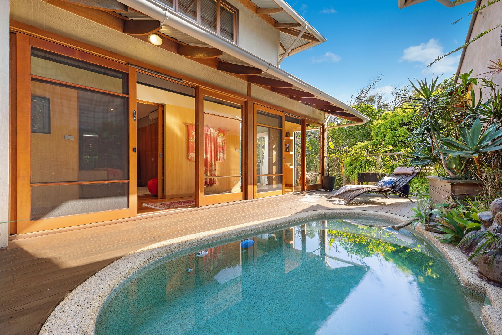 Property with resort-style pool on the market.